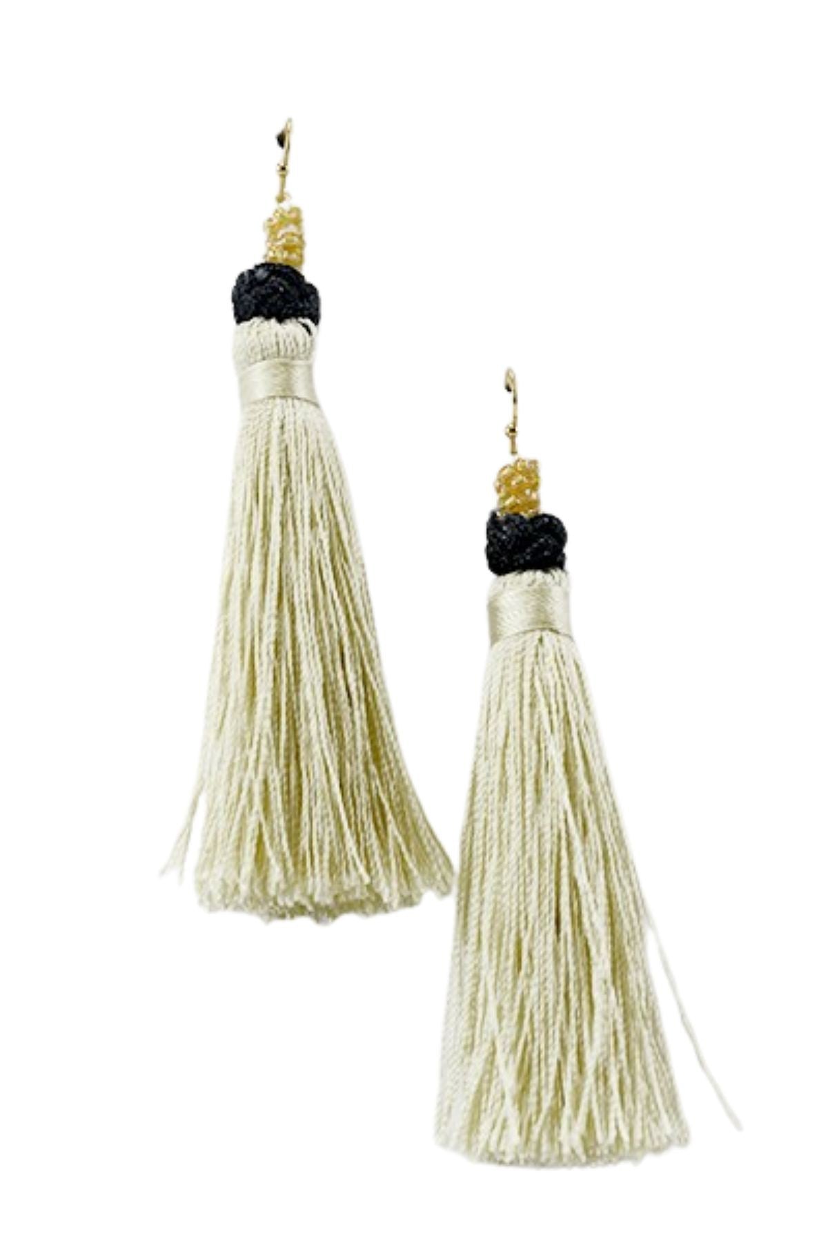 Elegant bead and tassel earrings with a 4-inch drop, featuring a fish hook closure.