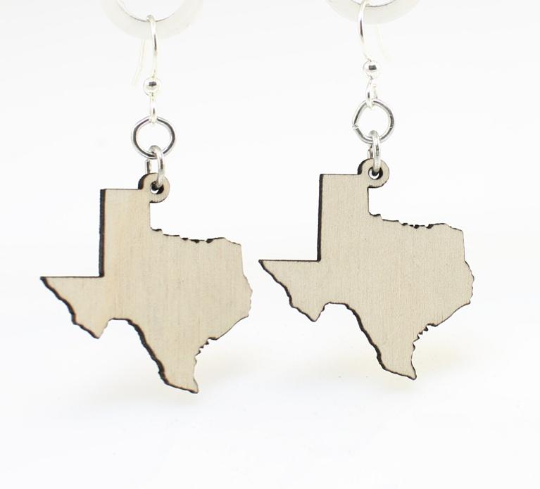 A pair of Texas State Earrings made from lightweight, sustainably sourced wood, featuring a natural wood finish and silver-finished stainless steel ear wires.