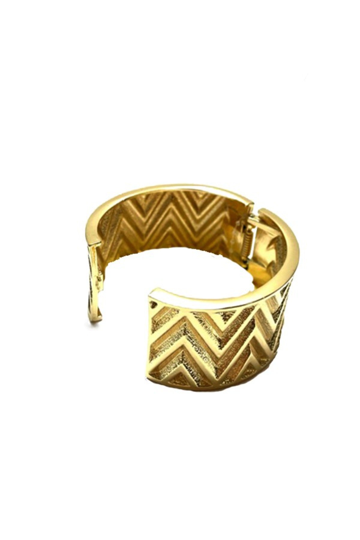 A stylish textured cuff bracelet with a spring snap closure, showcasing its unique design and approximate 2-inch width.