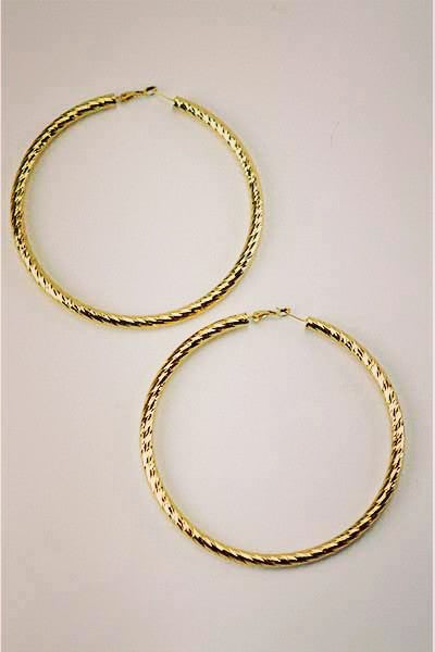 Large textured hoop earrings with omega closure, showcasing a stylish design.