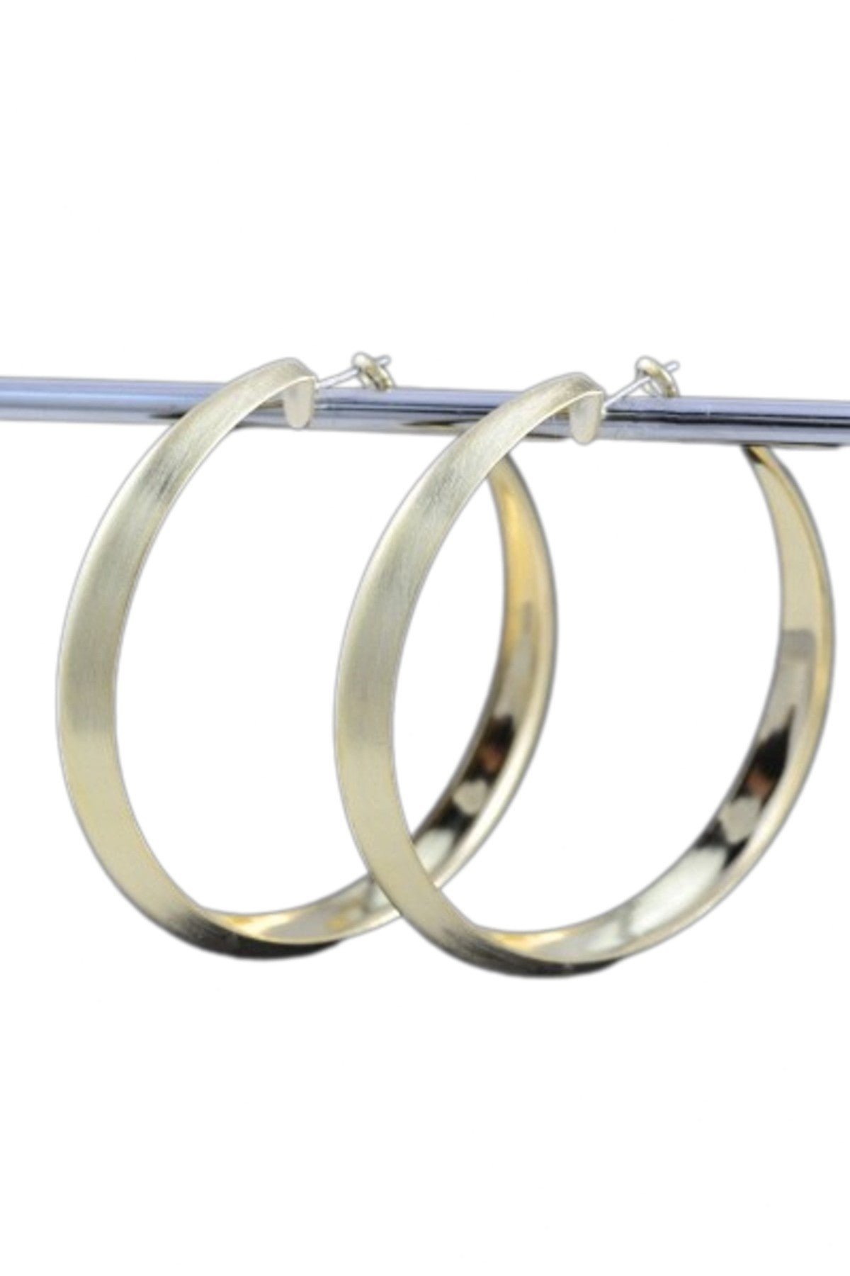 Elegant textured hoop earrings with a lever back closure, showcasing a double plated finish and a 2-inch drop length.