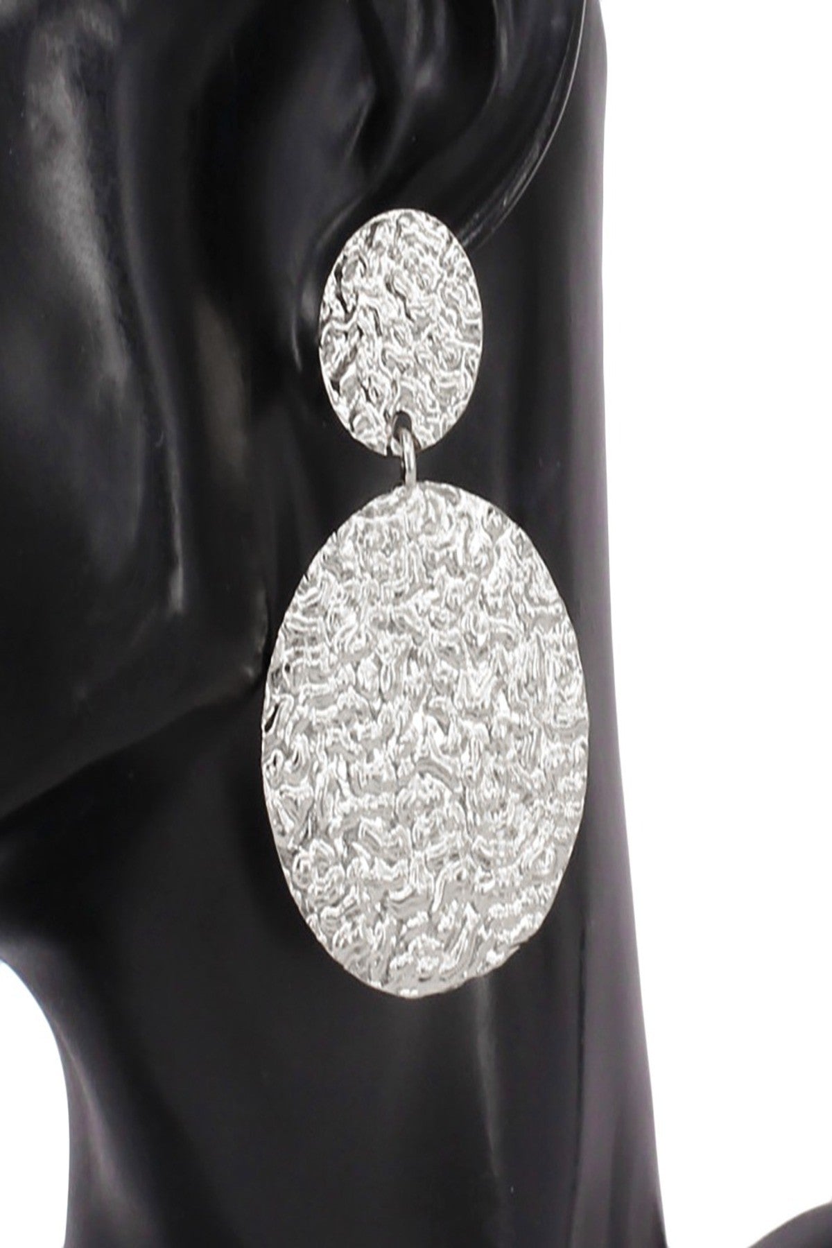 A pair of stylish textured metal earrings with a 2-inch drop, featuring a post back closure, suitable for various occasions.