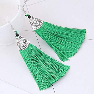 A pair of vibrant green Thread Tassel drop earrings featuring intricate thread design and metal caps, perfect for boho fashion lovers.