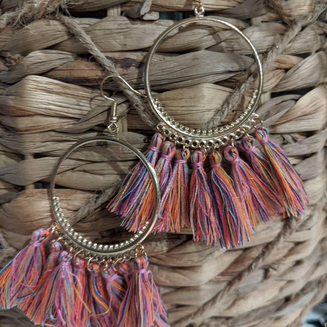 A pair of trendy tassel earrings featuring vibrant colors and a lightweight design, perfect for spring and summer outfits.