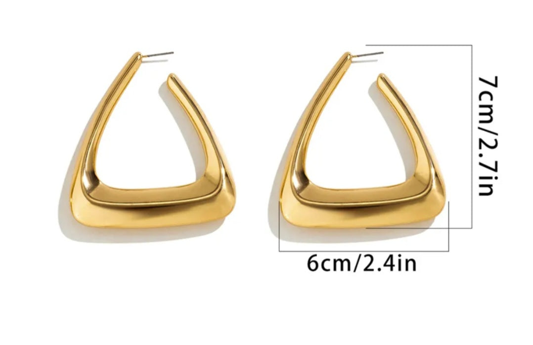 A pair of elegant triangular gold earrings showcasing a modern design, perfect for any occasion.