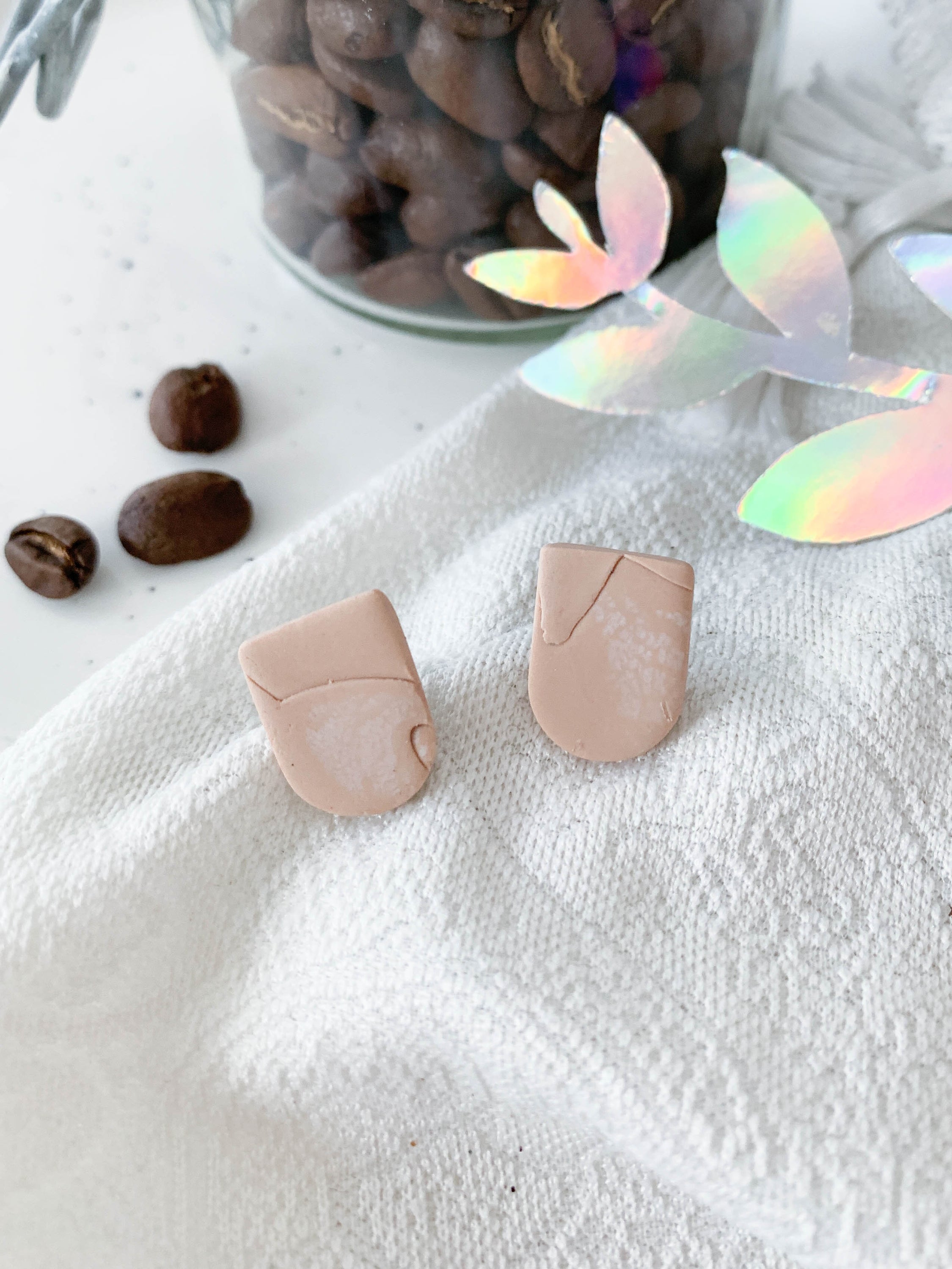 Handmade Ulma Latte earrings featuring unique marbling and surgical steel posts, perfect for sensitive ears.