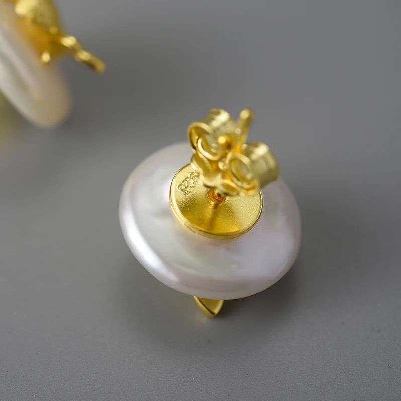 Vintage Bee Stud earrings in 18k gold with baroque pearls, showcasing intricate bee design and elegant luster.