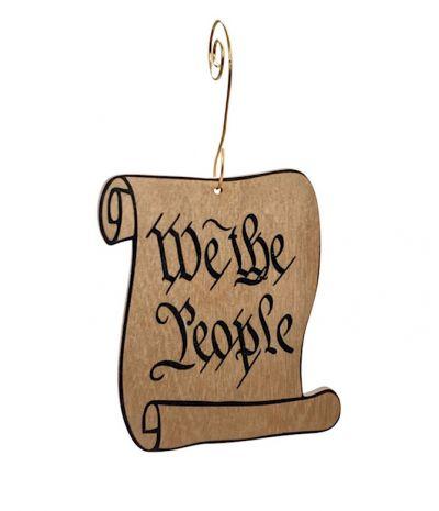 We the People Ornament #9879 made from eco-friendly birch wood and recycled paper, featuring a glossy finish and intricate laser-cut design.