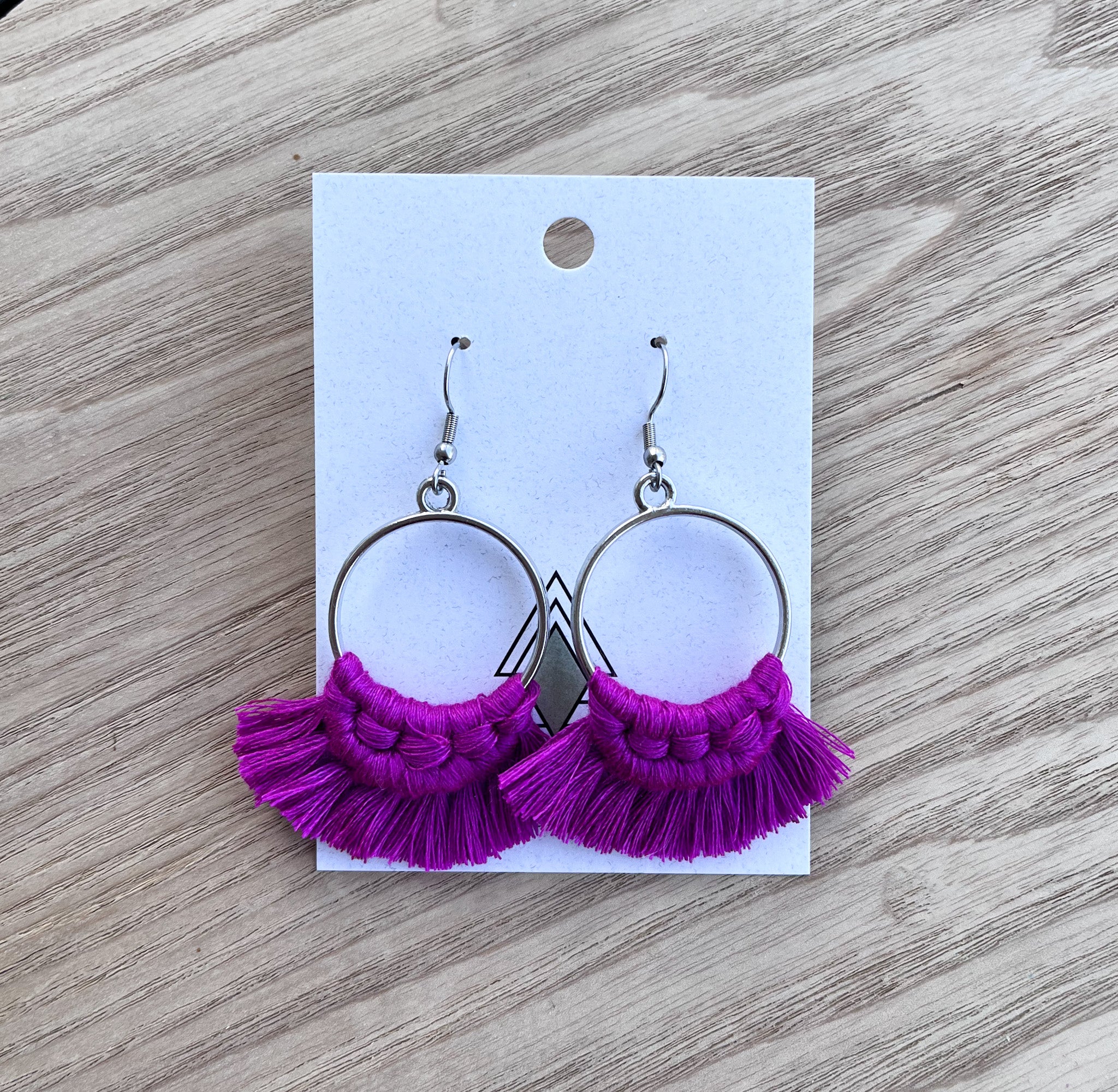 A pair of Winter Fuchsia Rounds made from 100% cotton, showcasing a vibrant fuchsia color, lightweight design, and health-conscious materials.