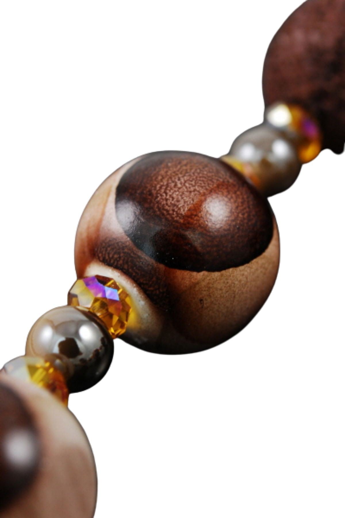 A stylish wooden ball bead necklace featuring a 20-inch chain and lobster claw clasp, showcasing natural wooden beads.