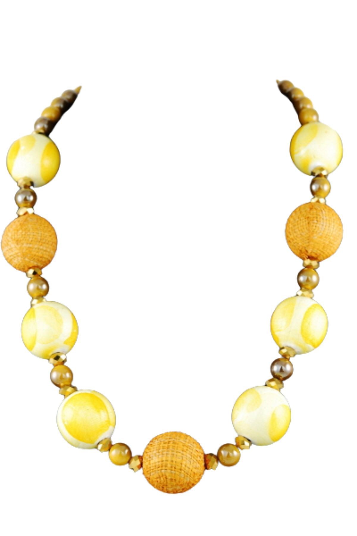 A stylish wooden ball bead necklace featuring a 20-inch chain and lobster claw clasp, showcasing natural wooden beads.