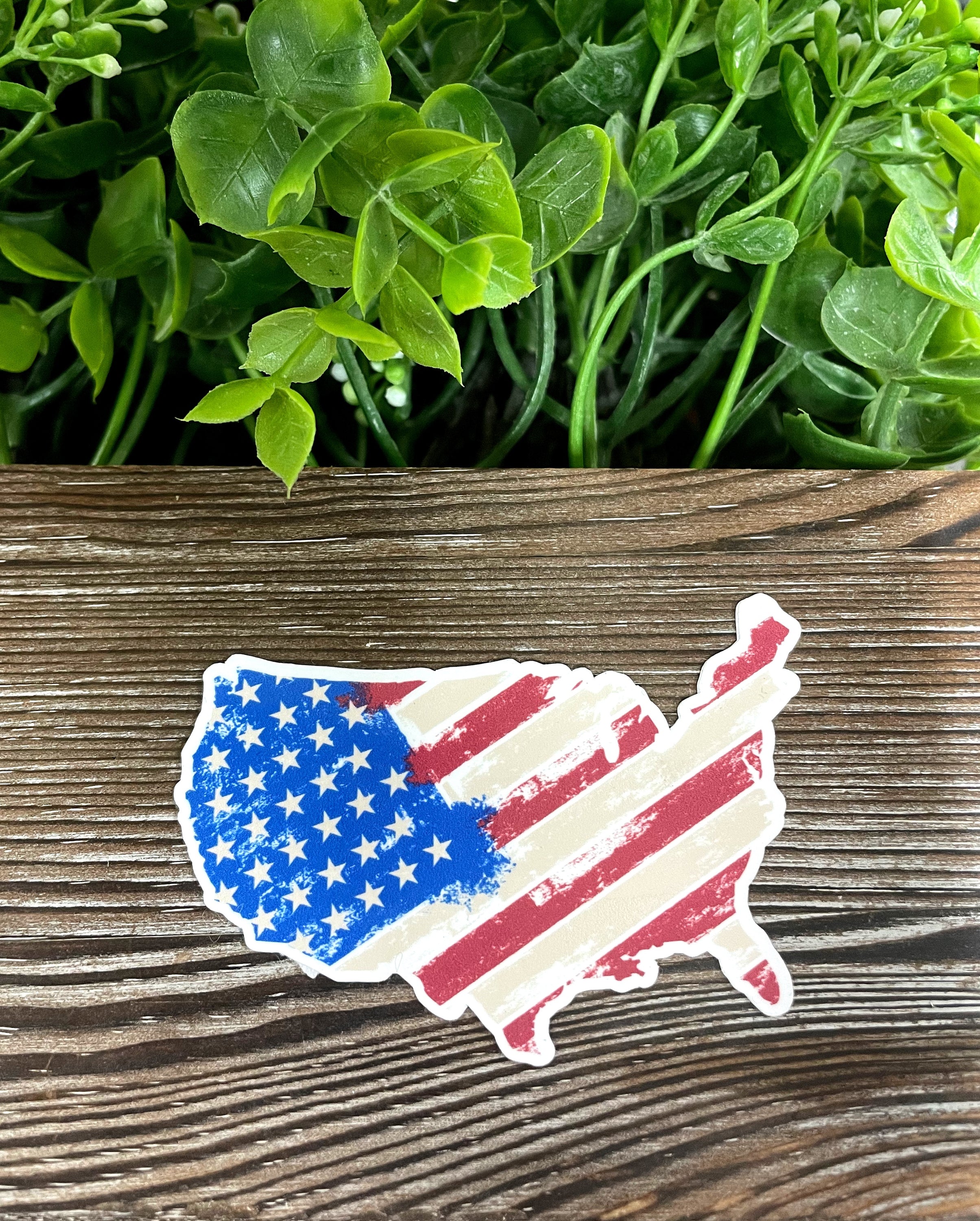 American Flag USA Sticker featuring vibrant colors and a die cut design, perfect for personalizing various smooth surfaces.