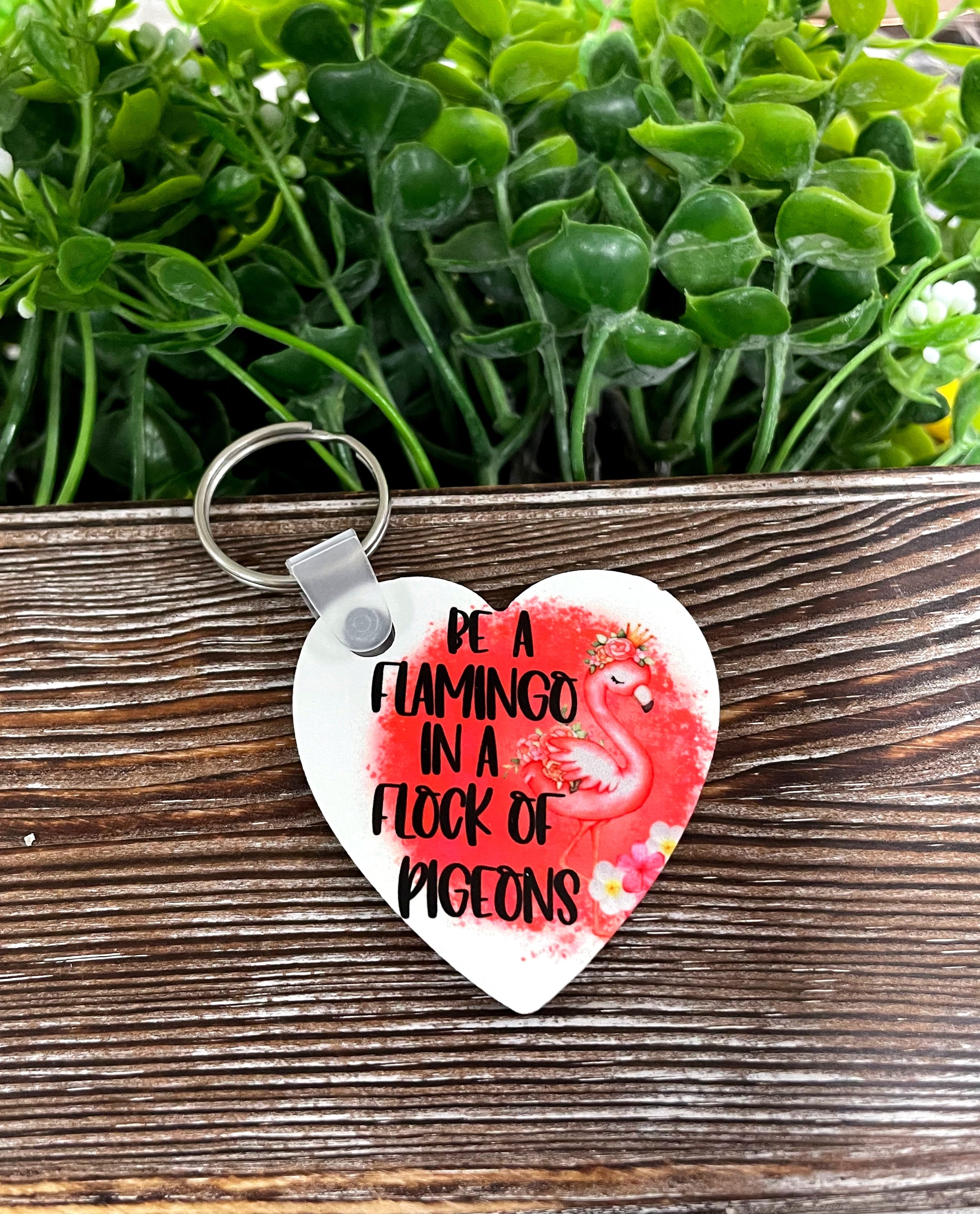 Be a Flamingo in a Flock of Pigeons MDF Heart Keychain featuring a vibrant flamingo design on lightweight engineered wood.