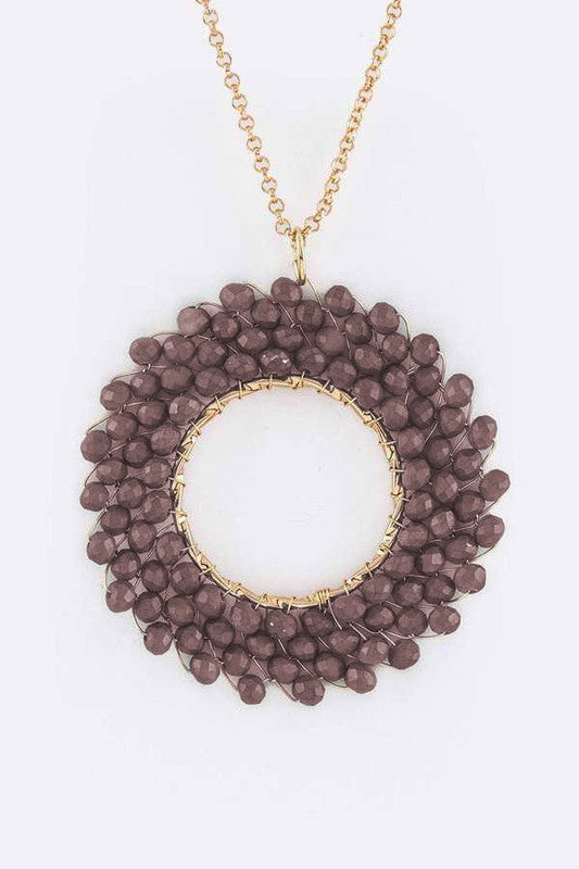 A stylish Beaded Hoop Pendant Necklace featuring a unique beaded design, 34 inches long with an extension, perfect for any outfit.