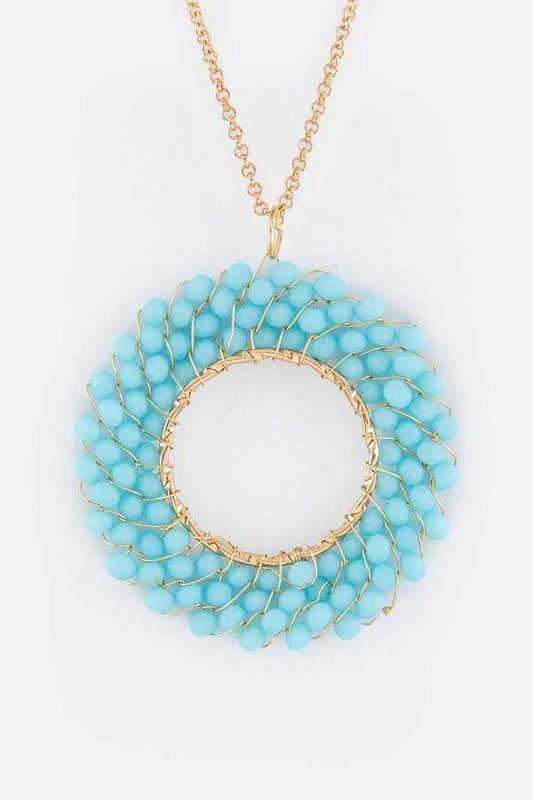 A stylish Beaded Hoop Pendant Necklace featuring a unique beaded design, 34 inches long with an extension, perfect for any outfit.