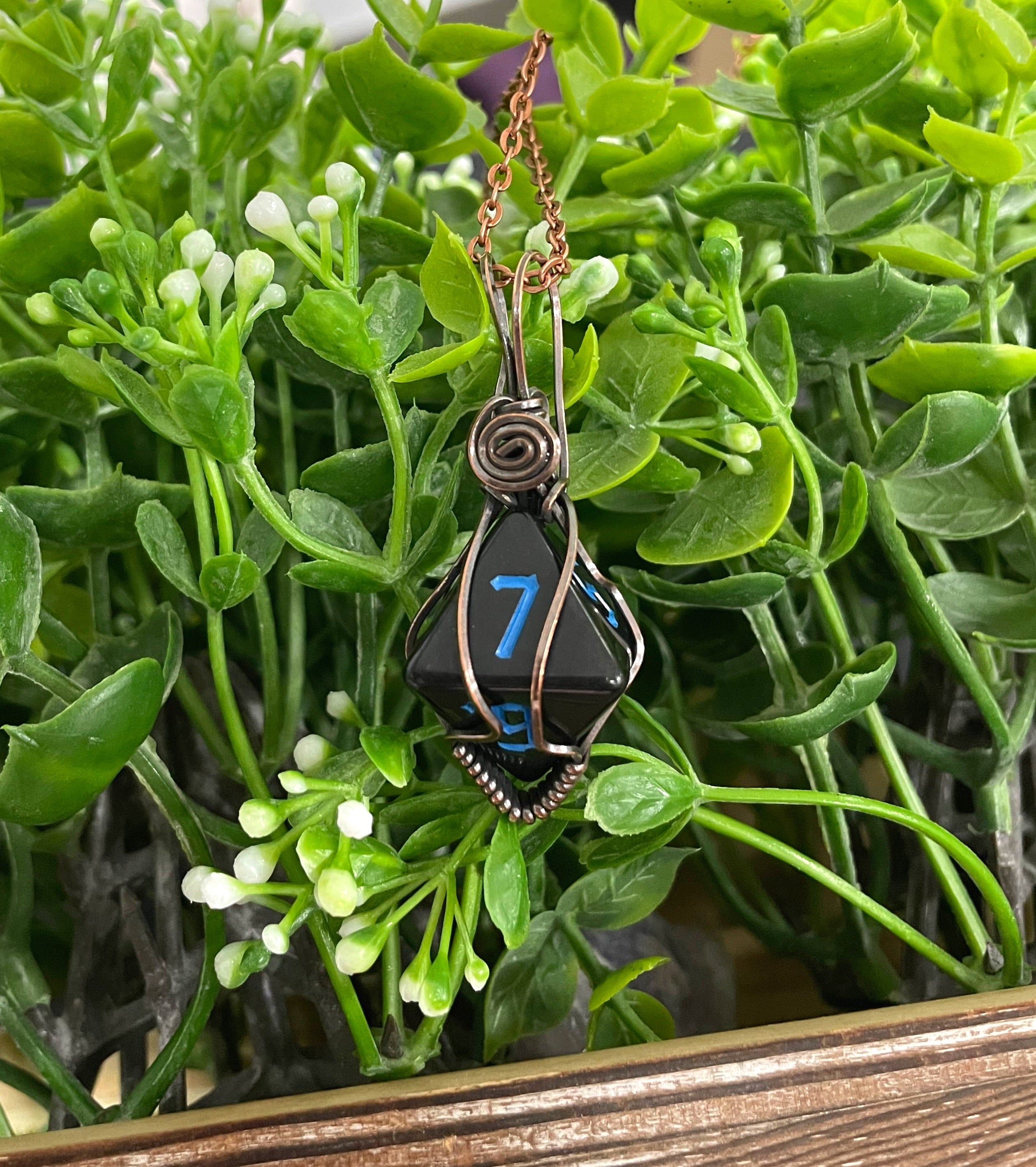 Black Wire Wrapped D8 Dice Pendant on a suede leather cord, showcasing oxidized copper wire wrapping and a vintage look.