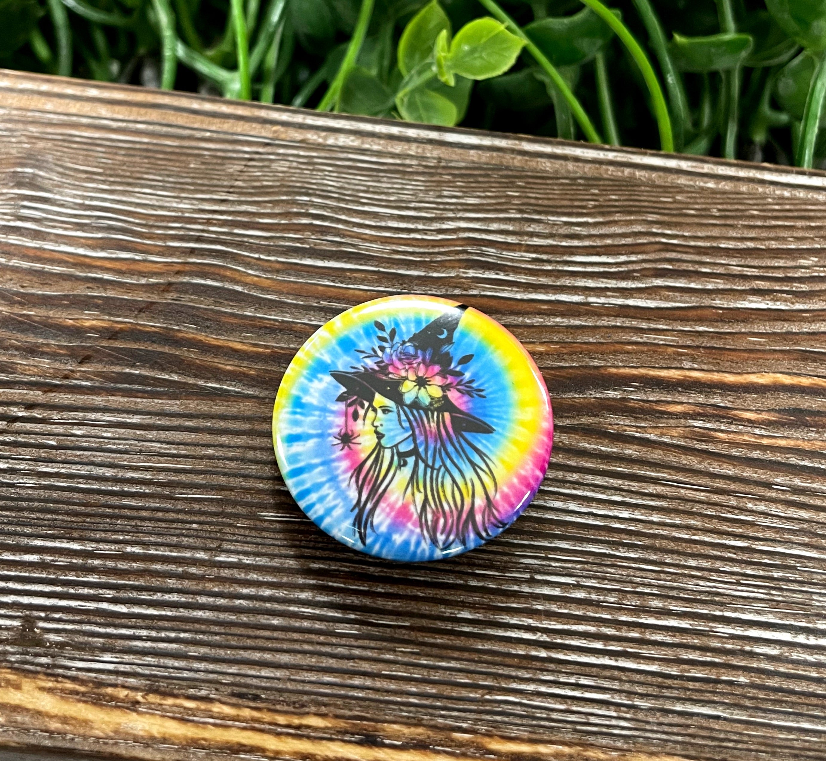 Colorful Blue Yellow Pink Tie Dye Button featuring a whimsical witch design, perfect for personalizing bags and accessories.