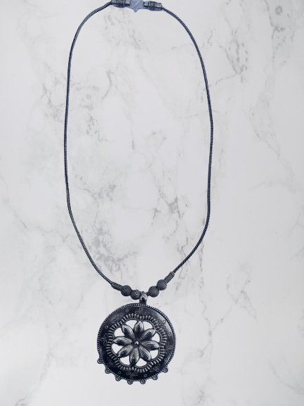 Bohotusk Flower Floral Shield Pendant Necklace featuring a floral design on a 54 cm chain, made from oxidised German silver.