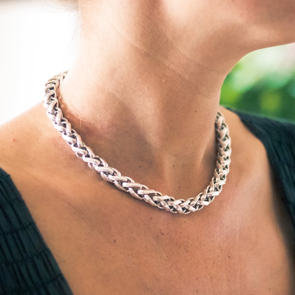 Elegant Braided Link short chain necklace made of interlocked silver links with lobster clasp closure, available in gold and silver plating.