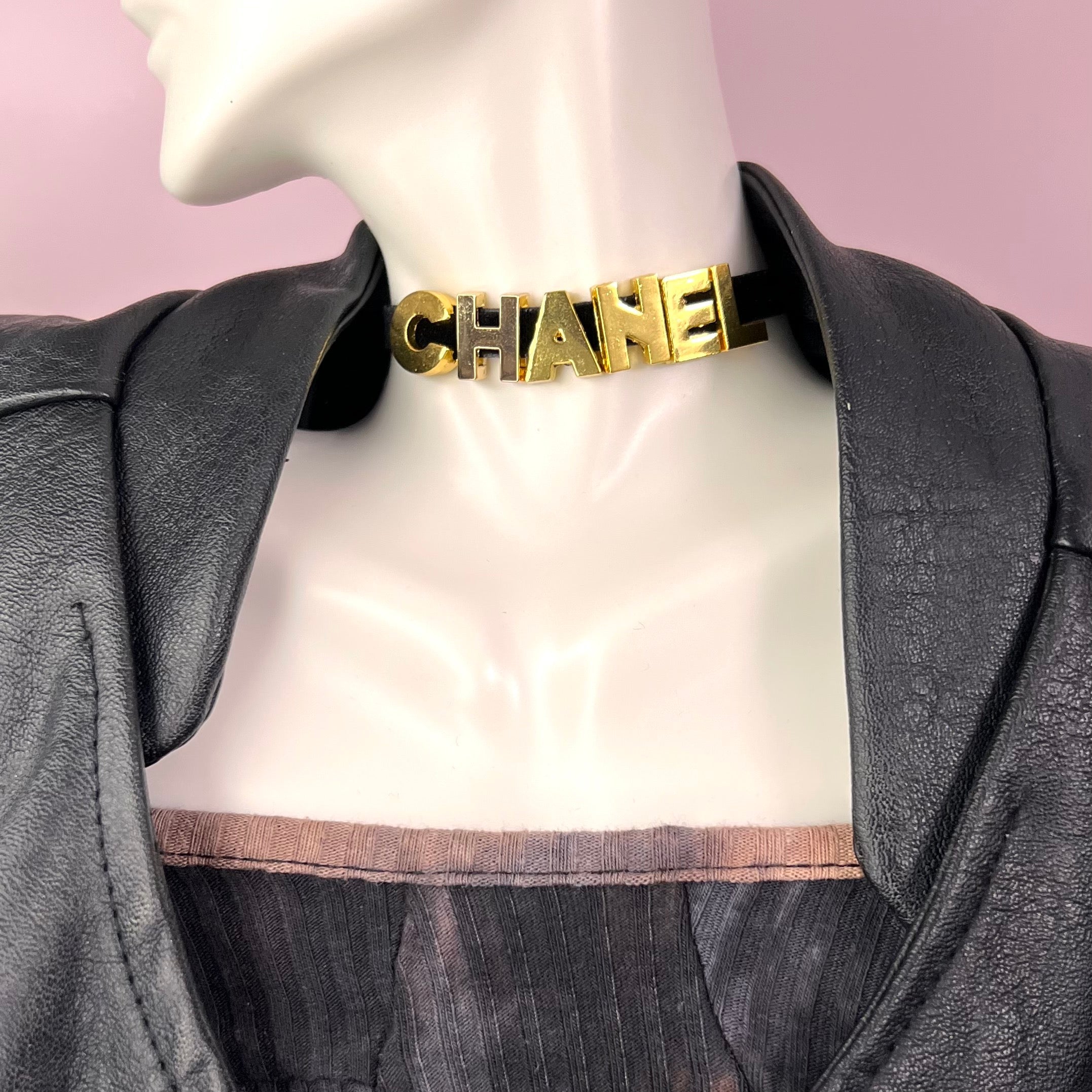 A stylish 'C' Choker Necklace featuring non-tarnish stainless steel letters on a soft velvet cord, available in gold and silver.