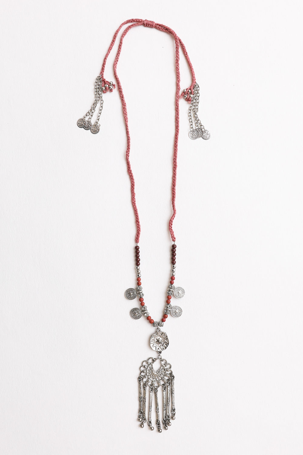 A stylish Charm Medallion with Back Lariat Necklace featuring intricate detailing and an adjustable lariat design, perfect for bohemian fashion.