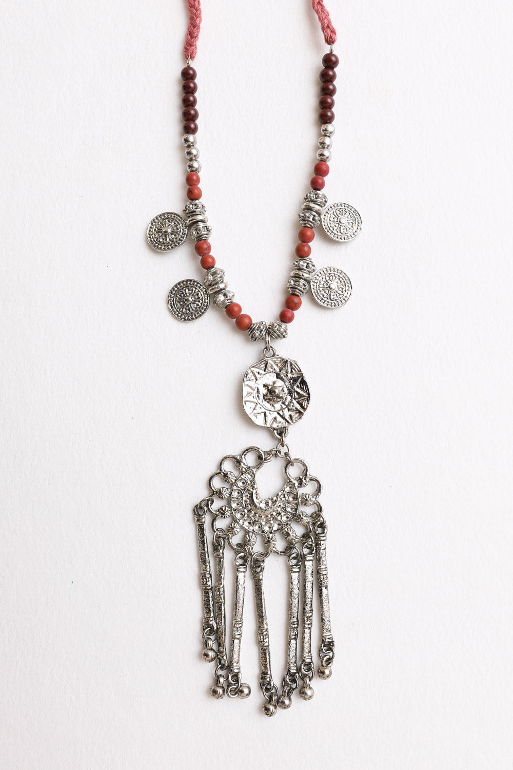 A stylish Charm Medallion with Back Lariat Necklace featuring intricate detailing and an adjustable lariat design, perfect for bohemian fashion.