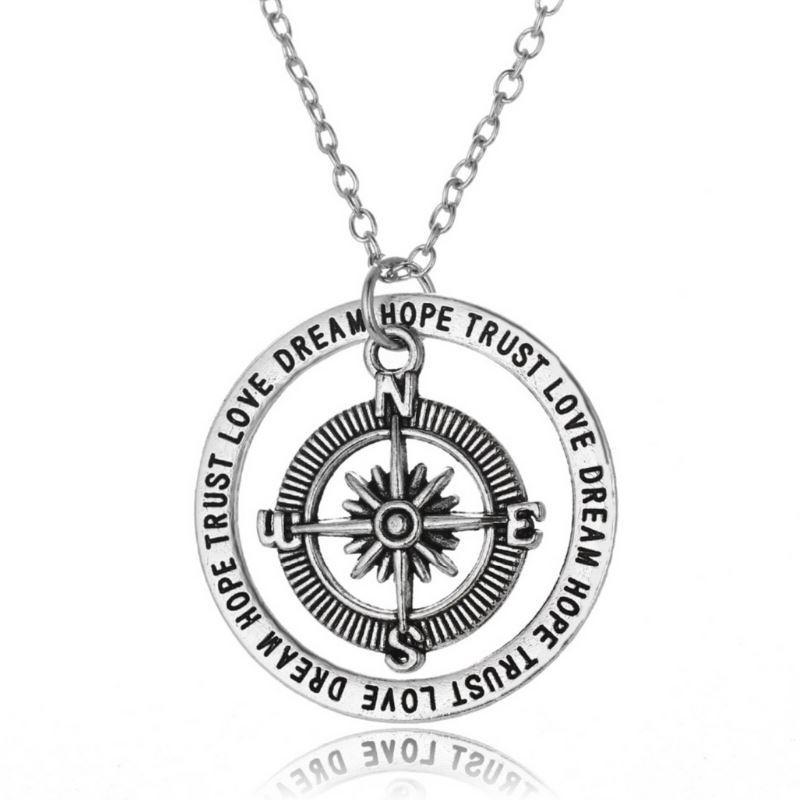 A stylish Compass Necklace featuring a 1.5-inch pendant with an outer circle engraved with 'Love, Dream, Hope, Trust'.