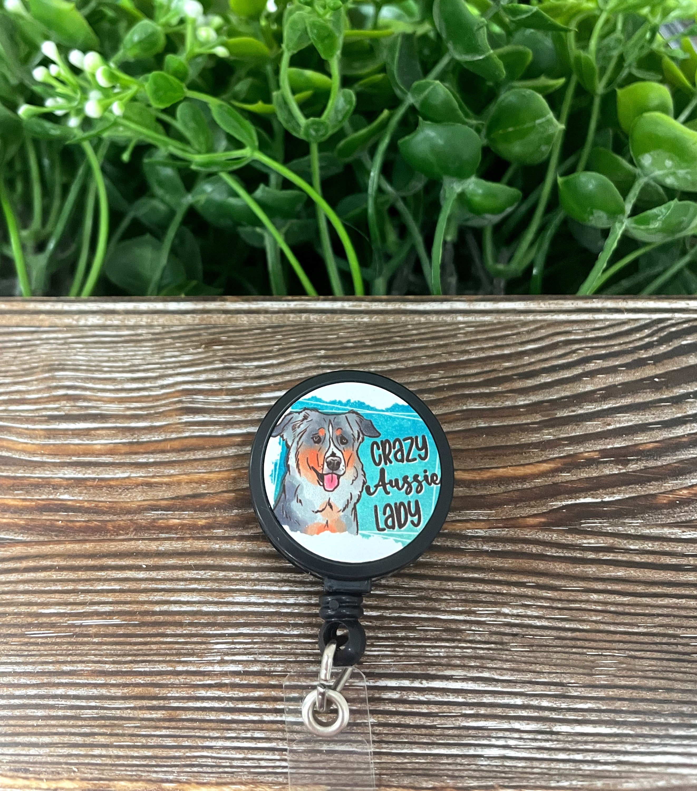 Crazy Aussie Lady retractable badge reel with boho design, featuring a metal blank and plastic reel, measuring 1.2 inches in diameter.