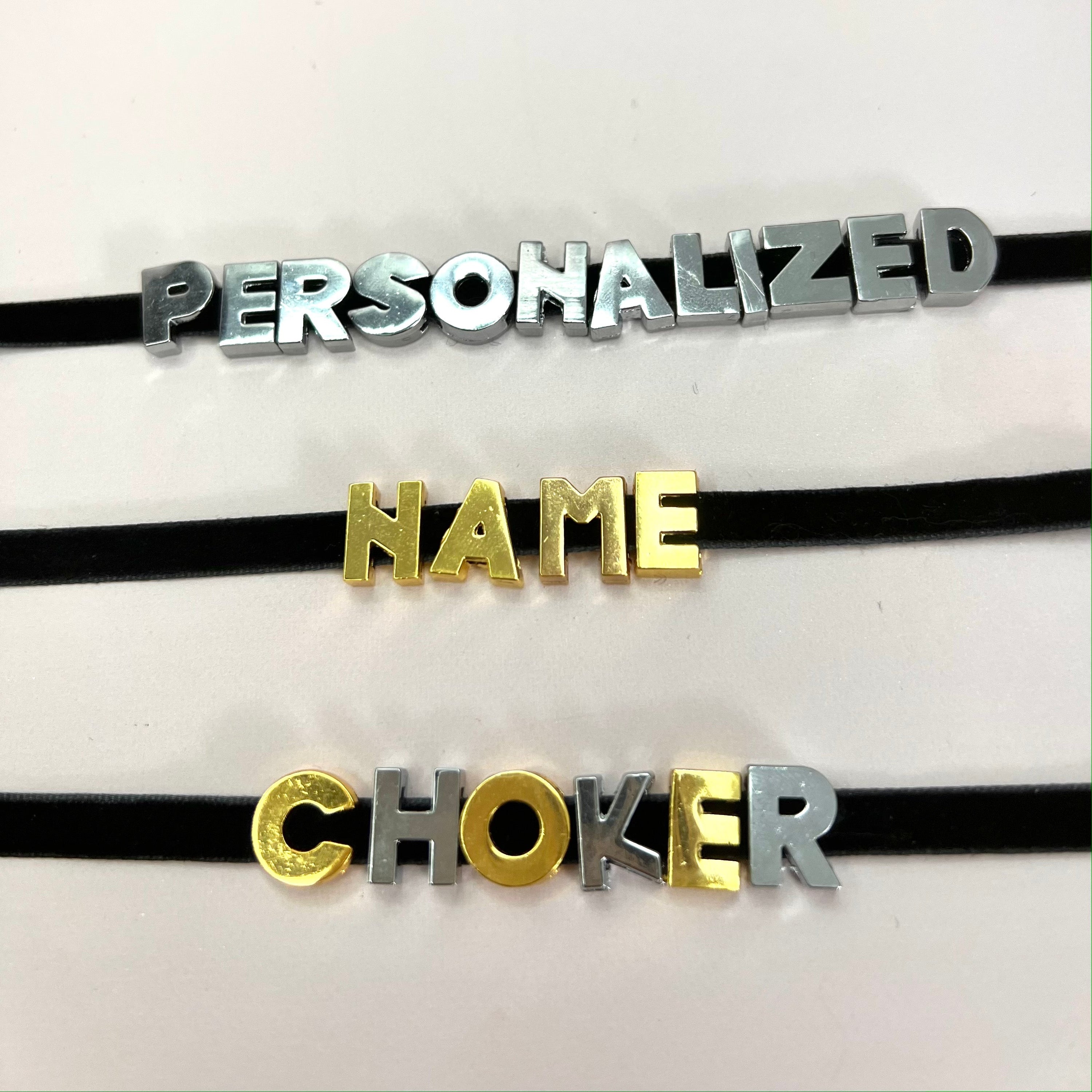 Custom Name Choker Necklace featuring personalized stainless steel letters on a velvet cord, available in gold and silver.