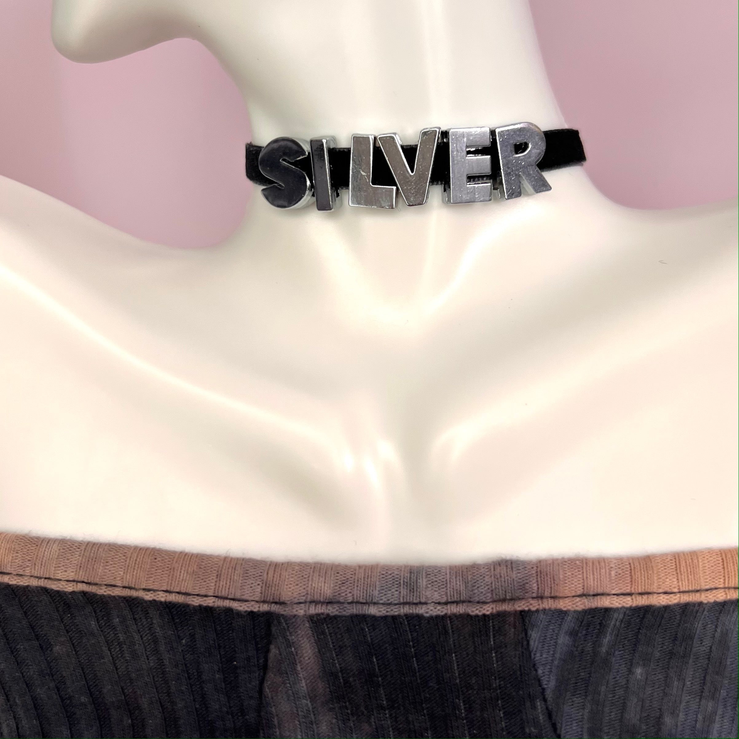 Custom Name Choker Necklace featuring personalized stainless steel letters on a velvet cord, available in gold and silver.