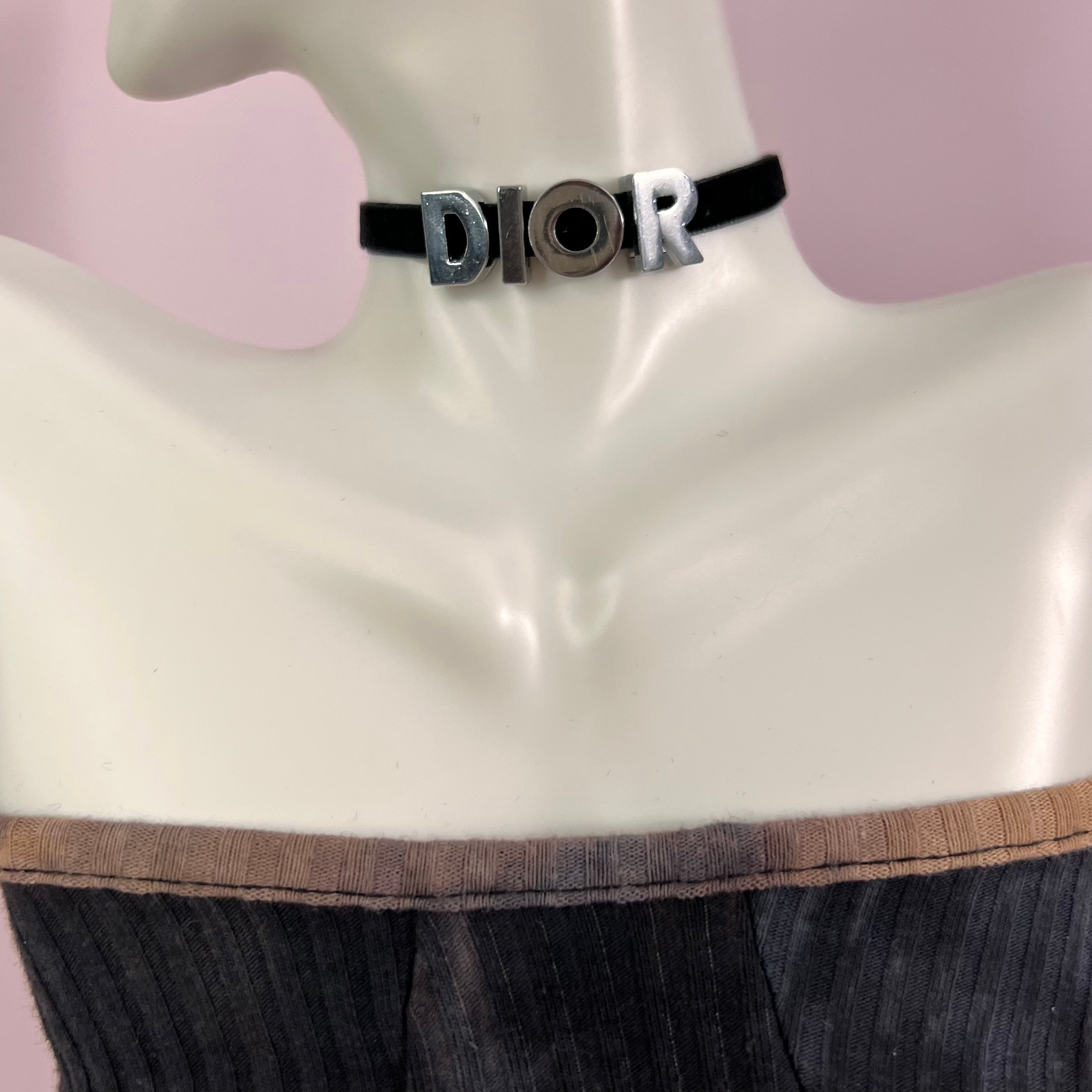 Elegant 'D' Choker Necklace made of non-tarnish stainless steel with a velvet cord, available in gold and silver.