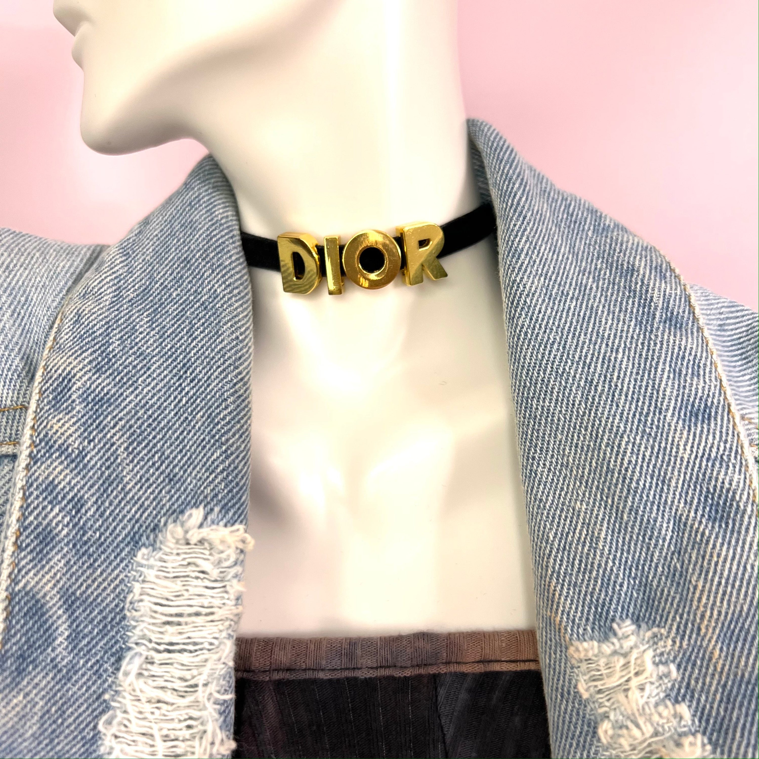 Elegant 'D' Choker Necklace made of non-tarnish stainless steel with a velvet cord, available in gold and silver.