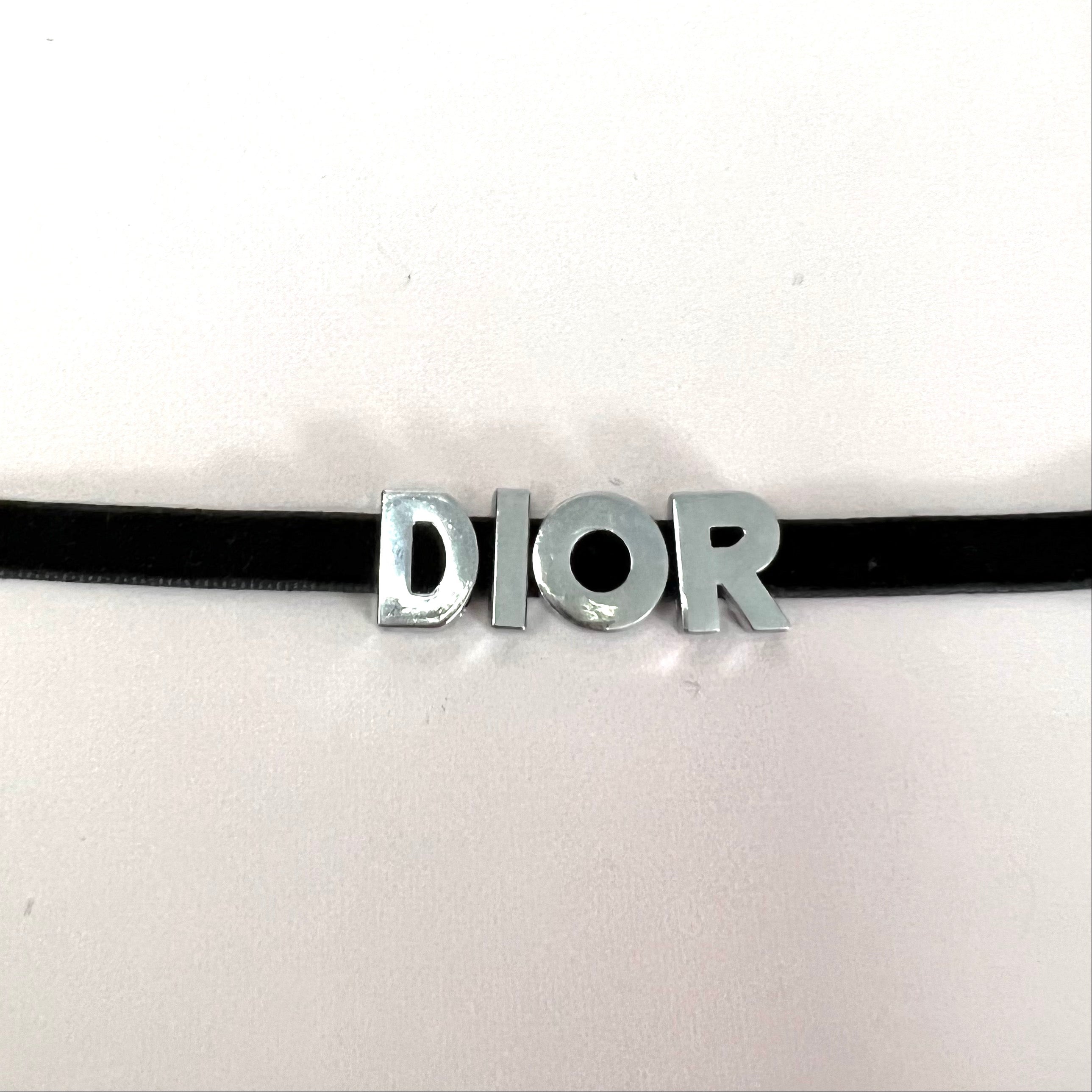 Elegant 'D' Choker Necklace made of non-tarnish stainless steel with a velvet cord, available in gold and silver.