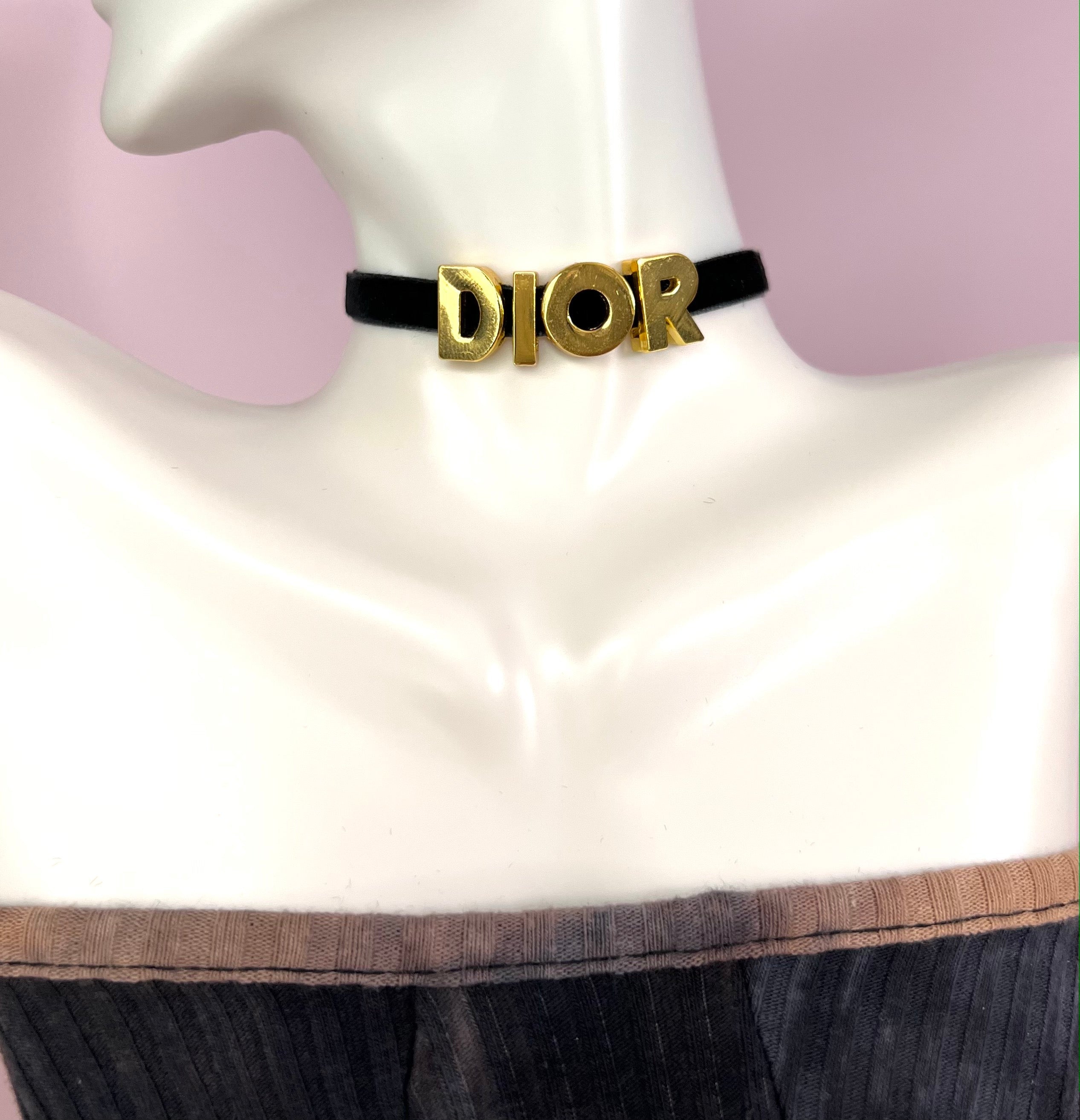 Elegant 'D' Choker Necklace made of non-tarnish stainless steel with a velvet cord, available in gold and silver.