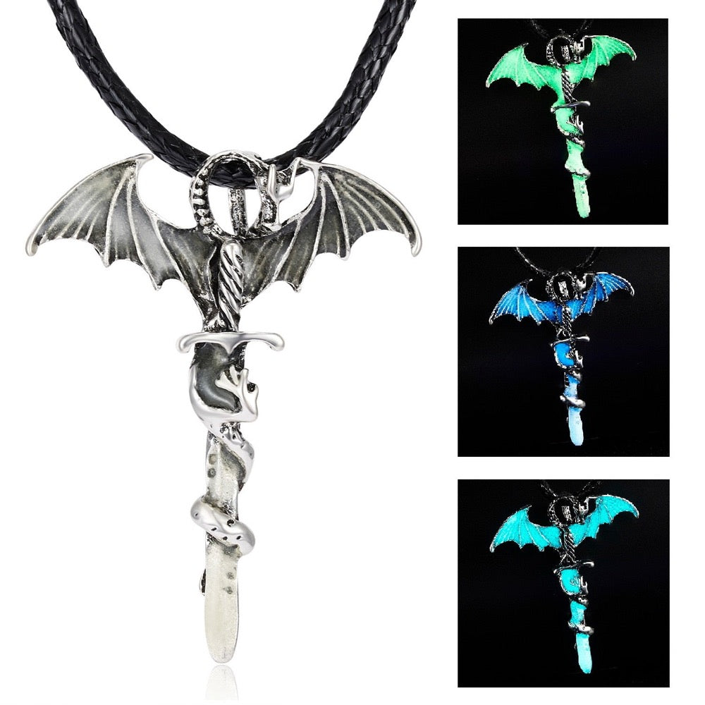 A glowing dragon pendant on a rope necklace, showcasing intricate details in blue, blue-green, and yellow-green colors.