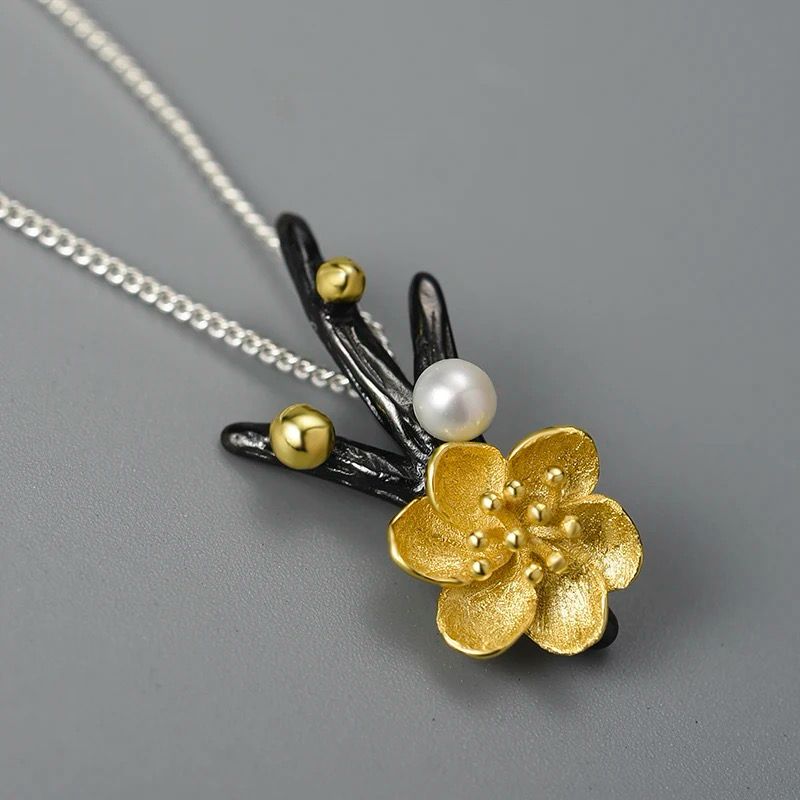 Elegant Flower Necklace featuring a pearl, crafted from sterling silver and gold-plated, showcasing a detailed Adonis flower design.