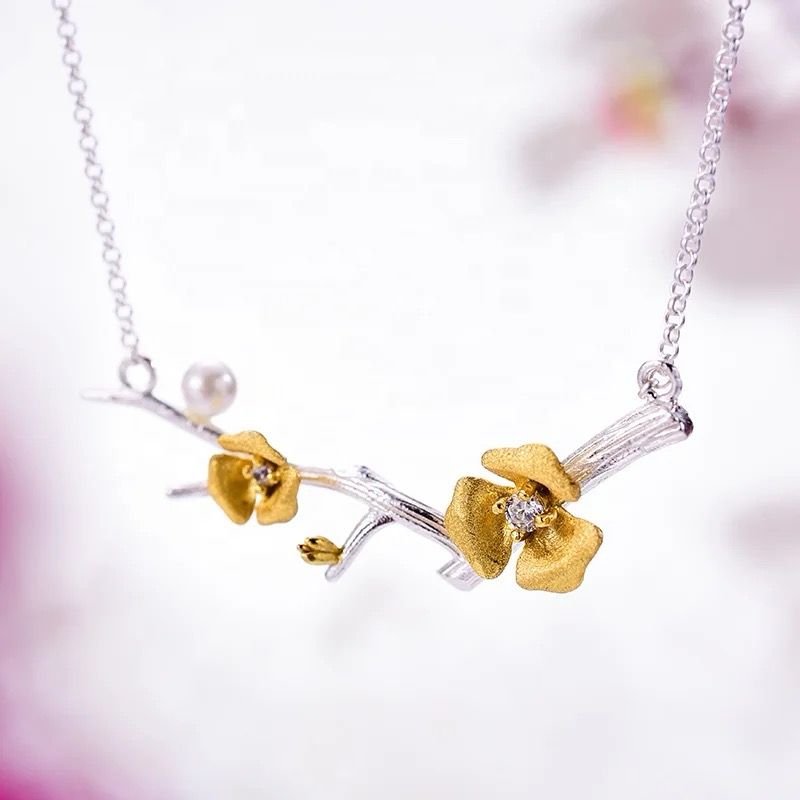 Elegant Flower Necklace featuring pearls and zircon gemstones, crafted from 925 silver with intricate floral designs.