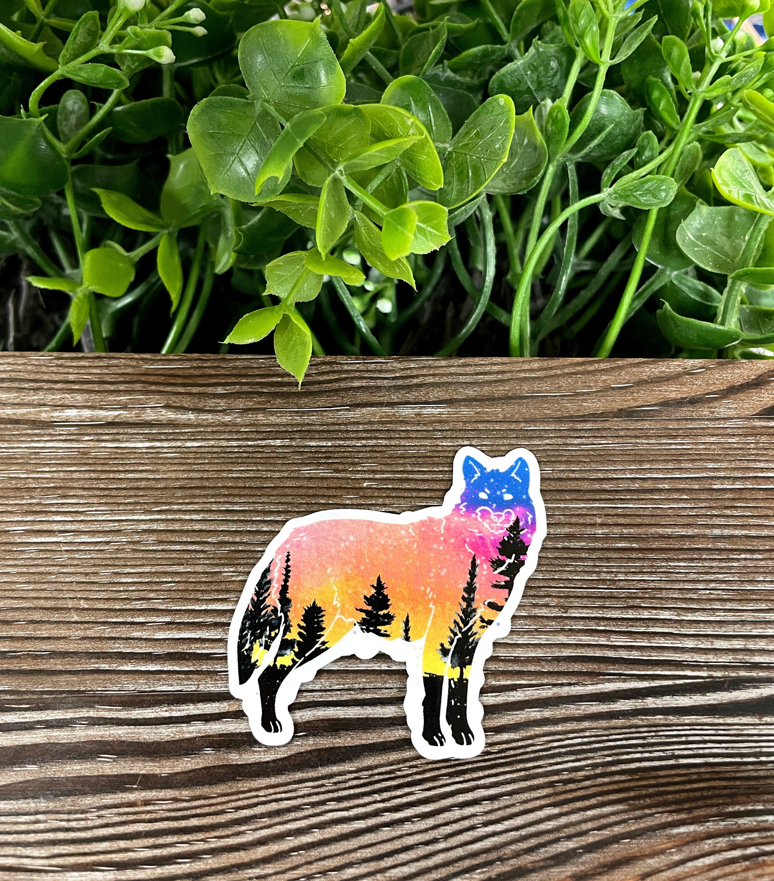 Galaxy Wolf Silhouette die cut vinyl sticker with a colorful galaxy background, showcasing a majestic wolf silhouette.