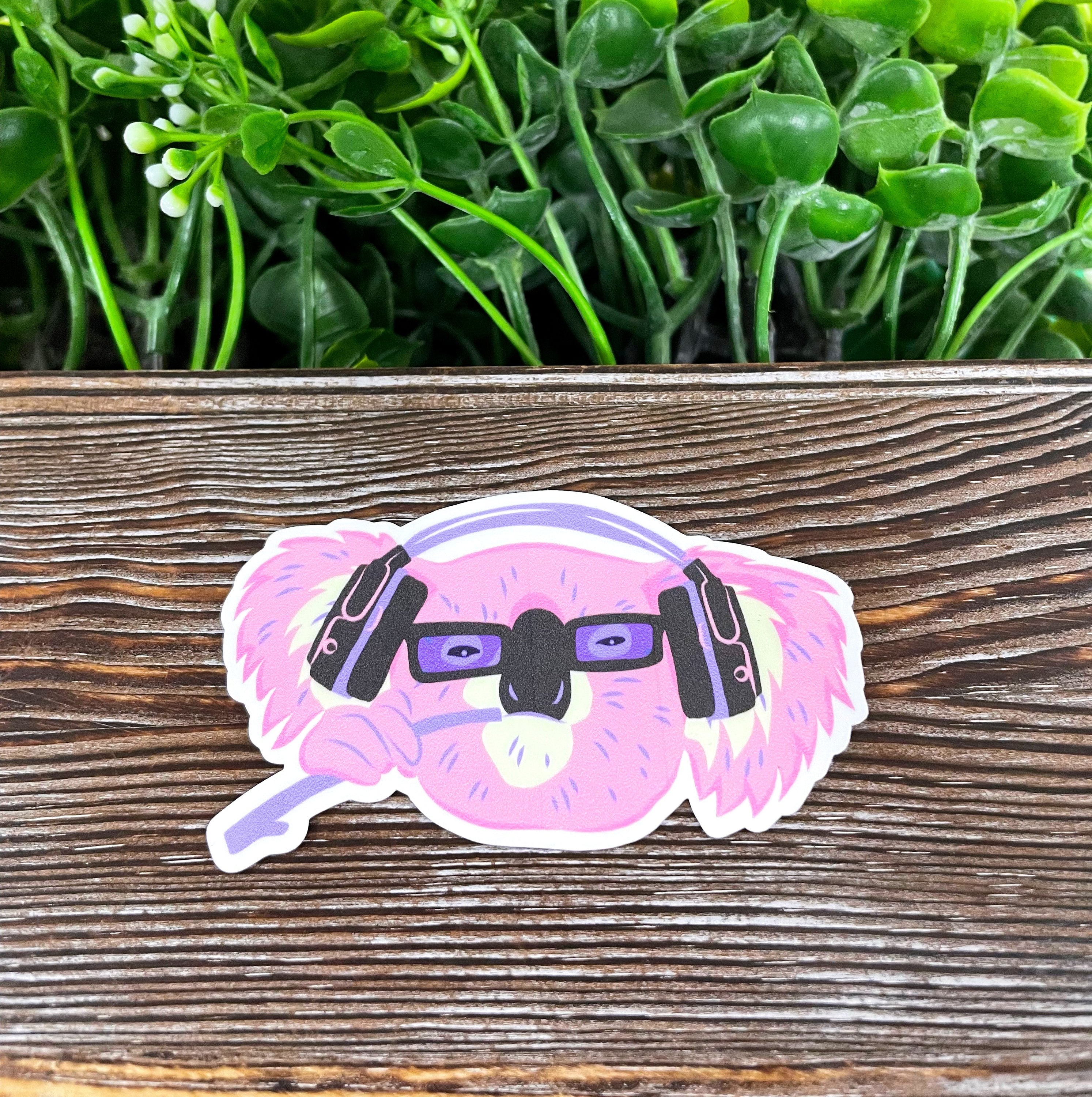 Colorful Gaming Koala die cut sticker on a smooth surface, showcasing its vibrant design and quality finish.