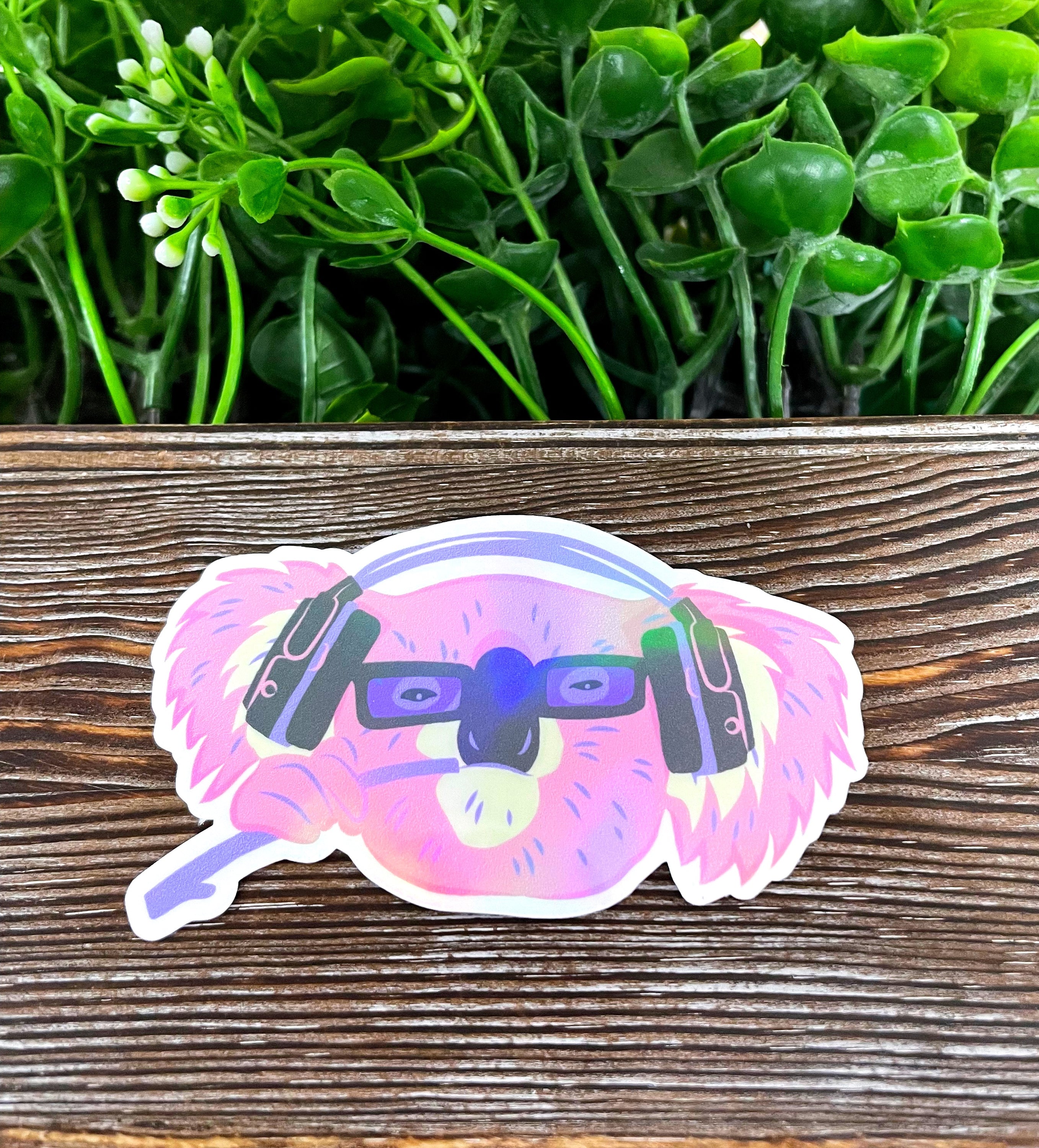 Gaming Koala die cut sticker featuring vibrant graphic art on quality vinyl, perfect for personalizing various surfaces.