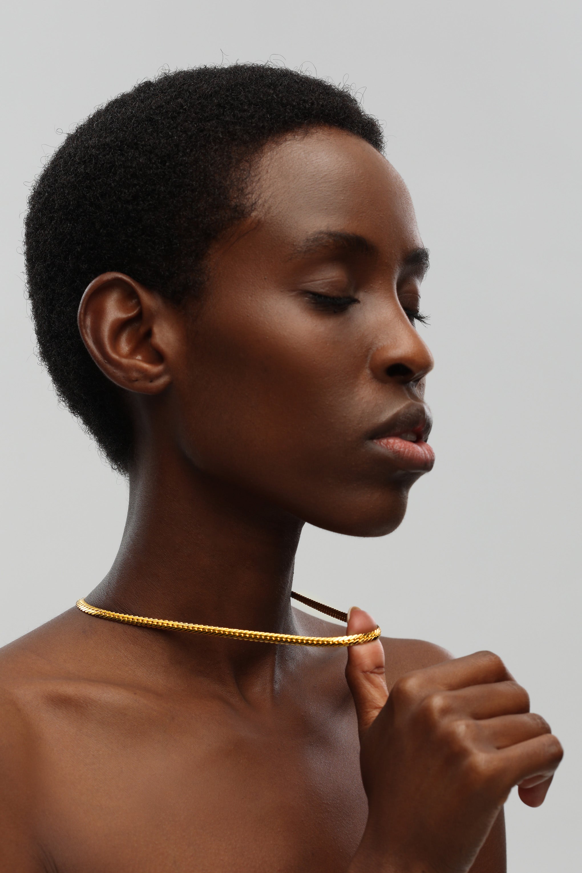 Gold Classic Herringbone Necklace featuring a sleek design and polished finish, perfect for layering or wearing alone.