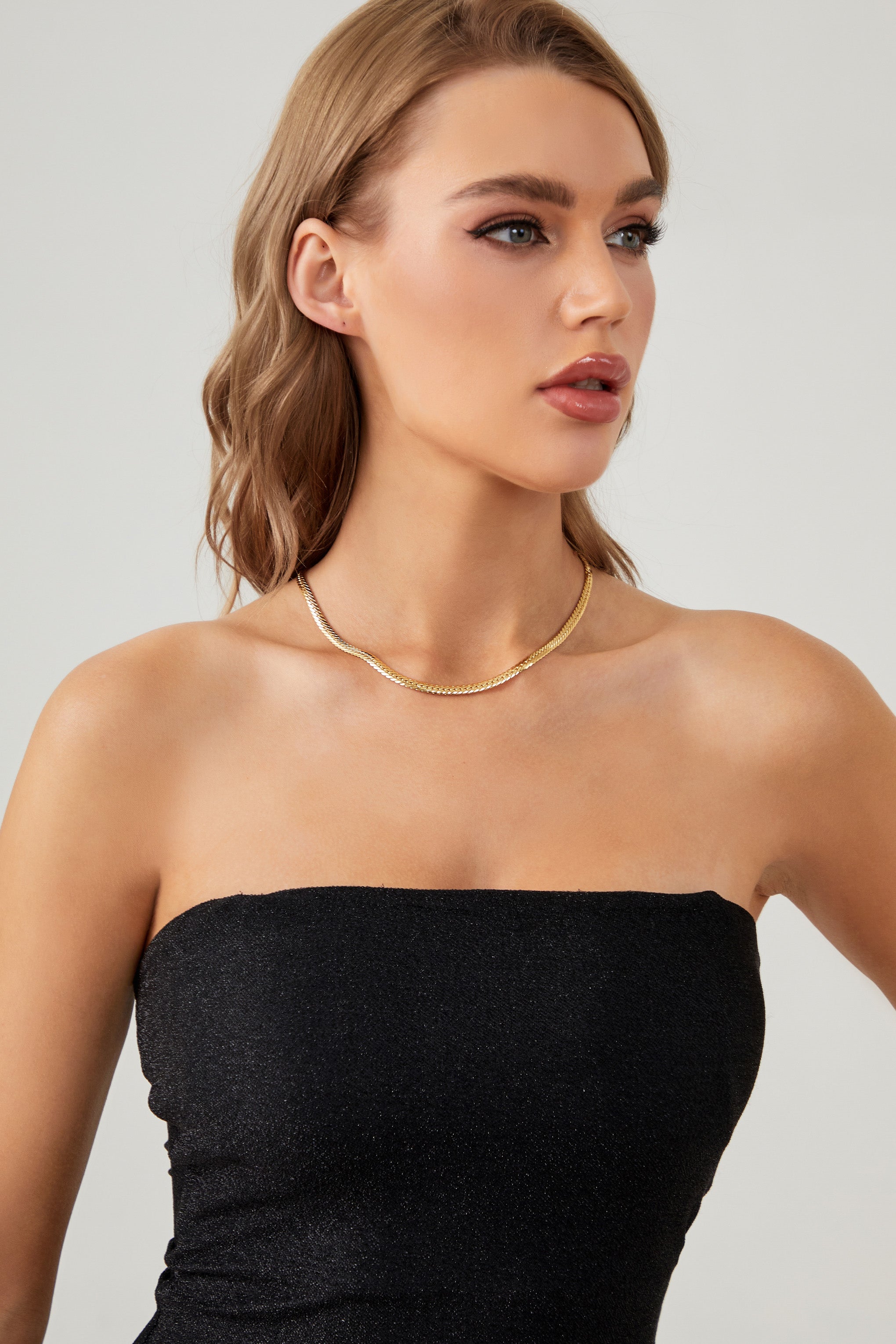 Gold Classic Herringbone Necklace featuring a sleek design and polished finish, perfect for layering or wearing alone.