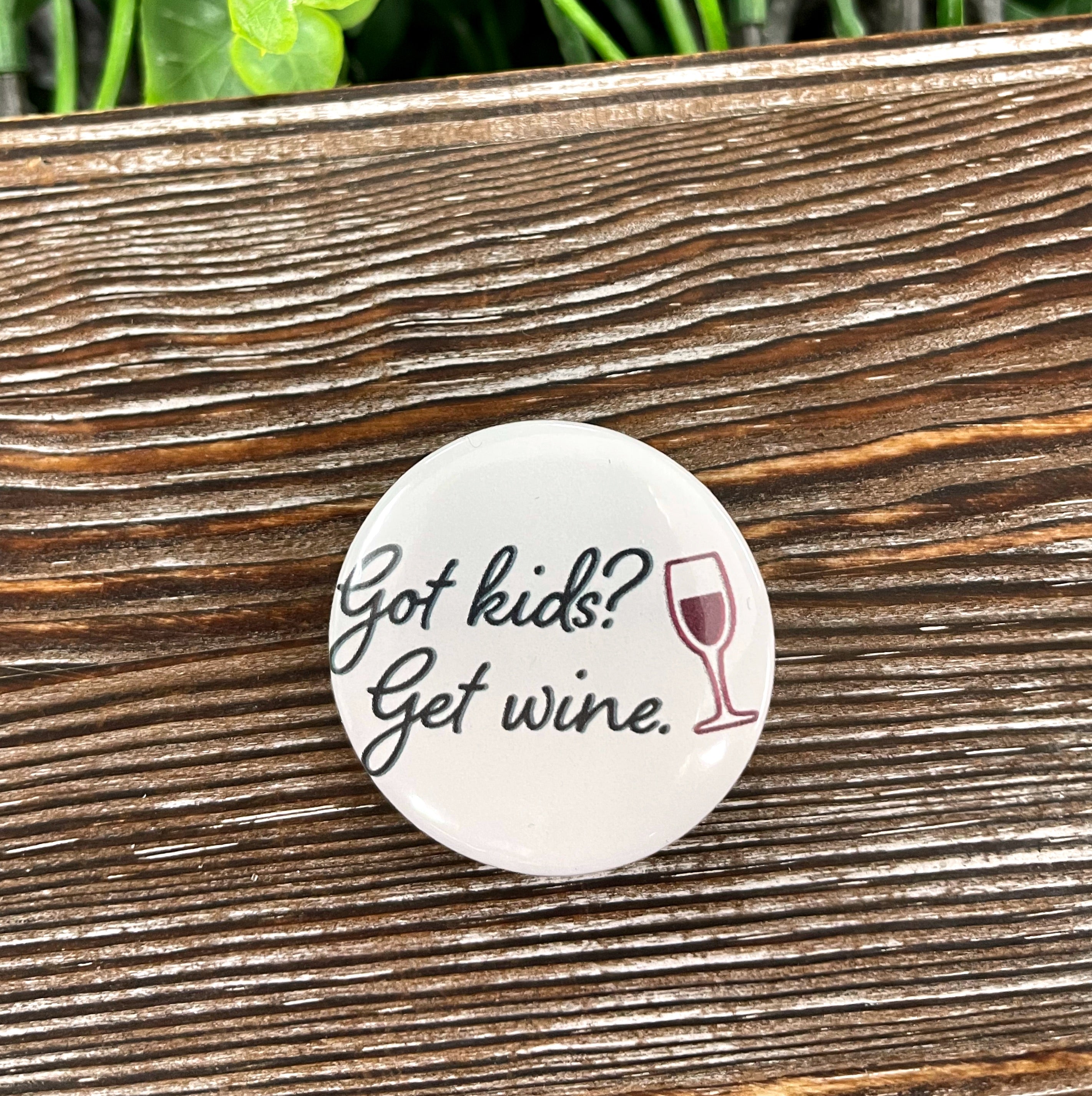 Got Kids, Get Wine Graphic Art Button, 1.25 inches, featuring a humorous design perfect for parents.