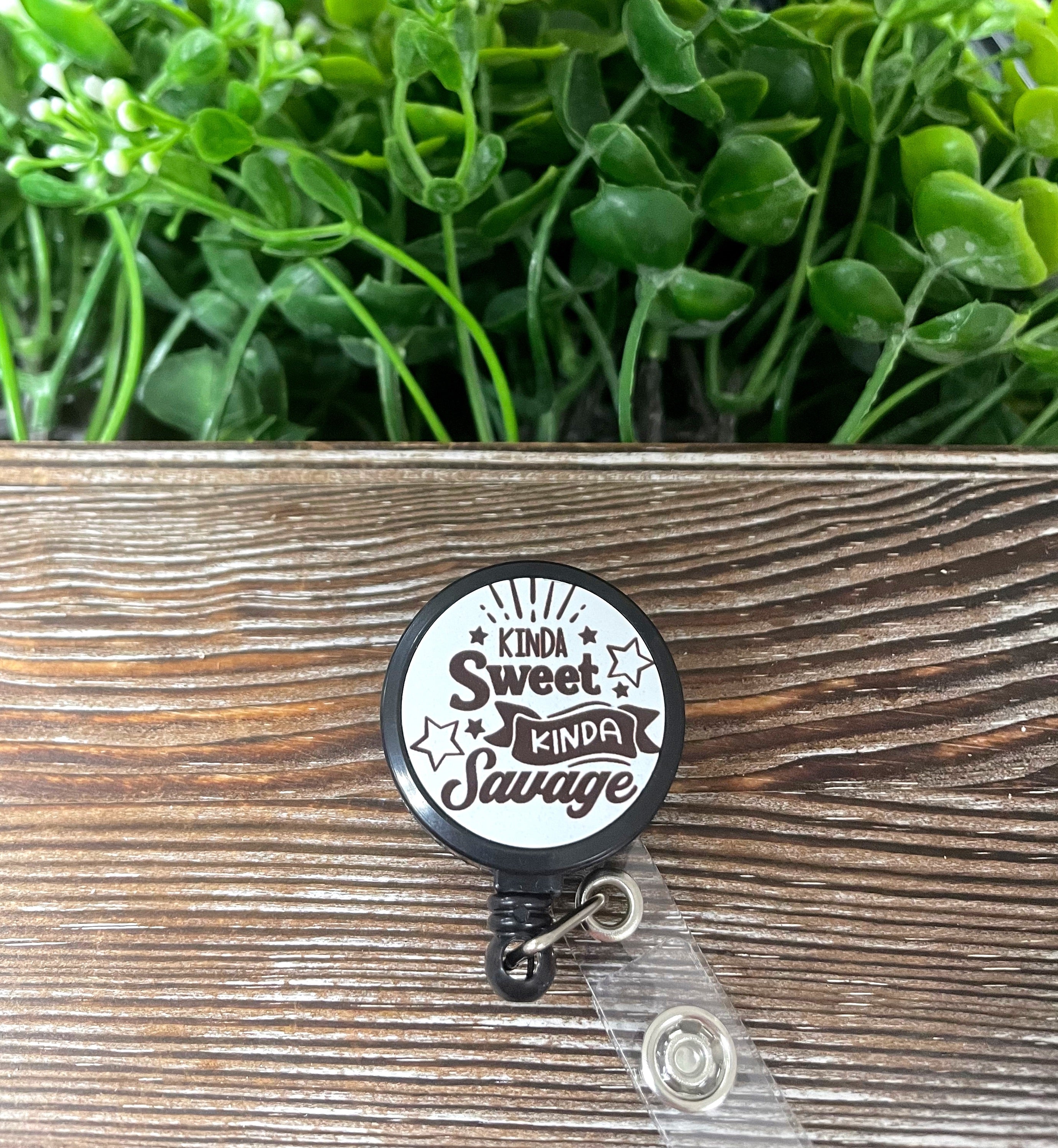 Kinda Sweet Kinda Savage retractable badge reel featuring a boho design on a metal blank with a plastic reel.