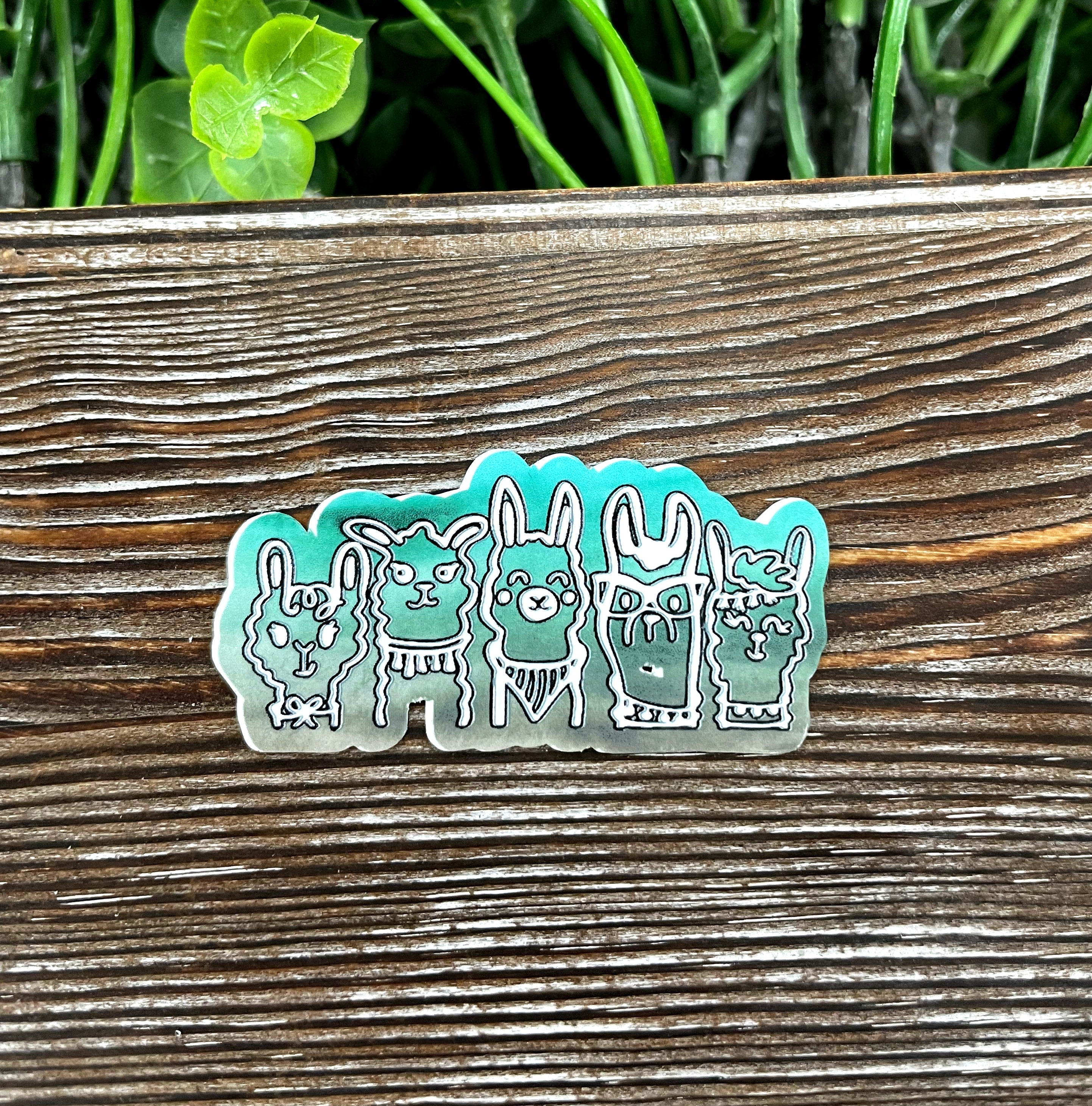 Llama die cut sticker on a smooth surface, showcasing vibrant colors and intricate design.