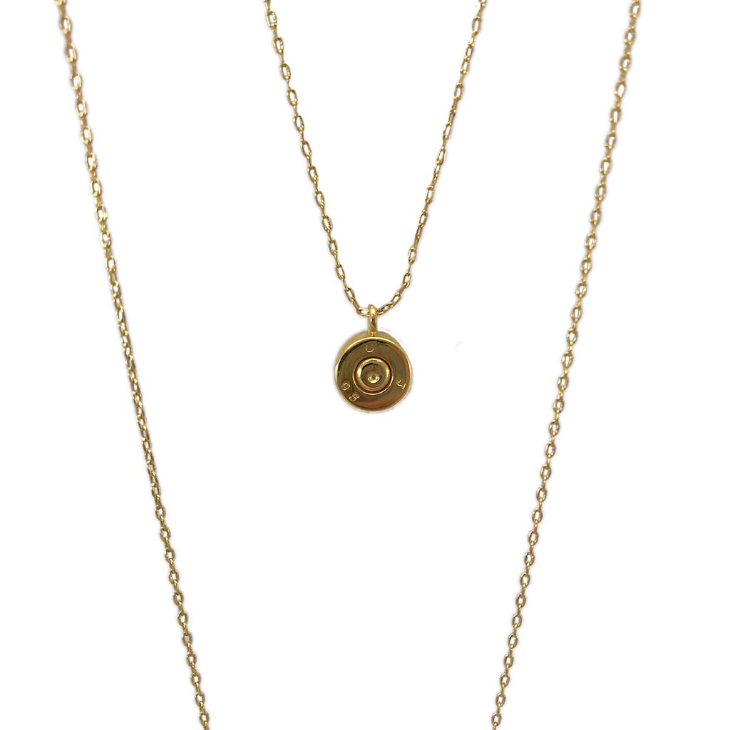 Layered Bar Bullet Necklace featuring recycled brass and bullet fragments, with a bar inscribed with 'peace' in Khmer, showcasing its unique design.