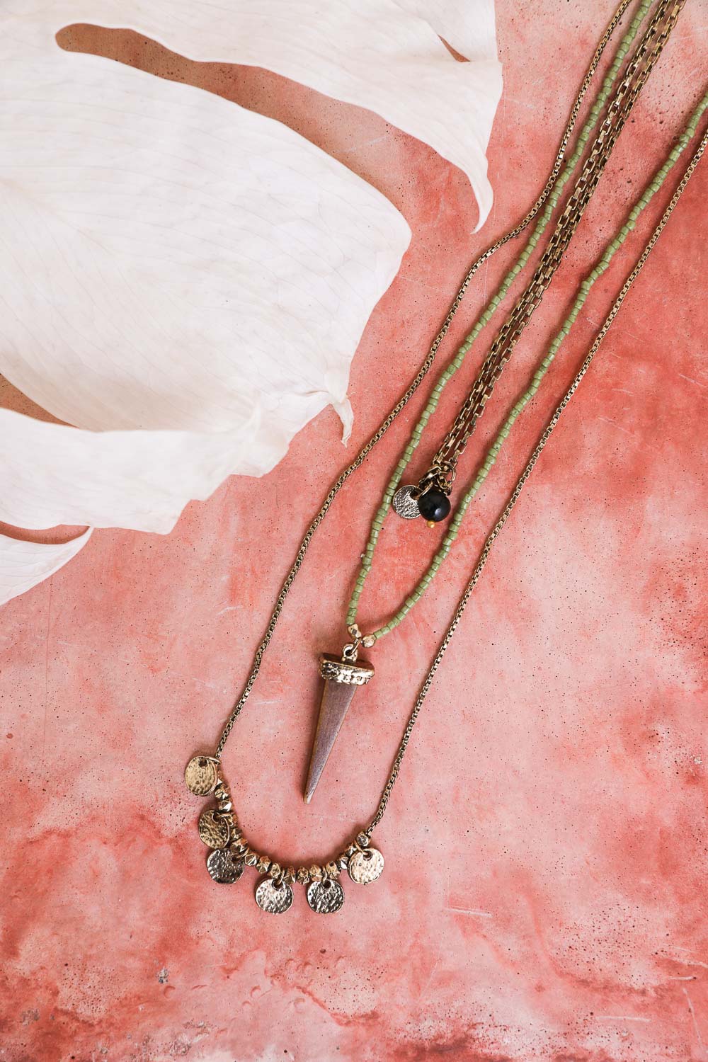 Layered Point Pendant Boho Necklace featuring delicate chains and dainty point pendants, perfect for bohemian style.