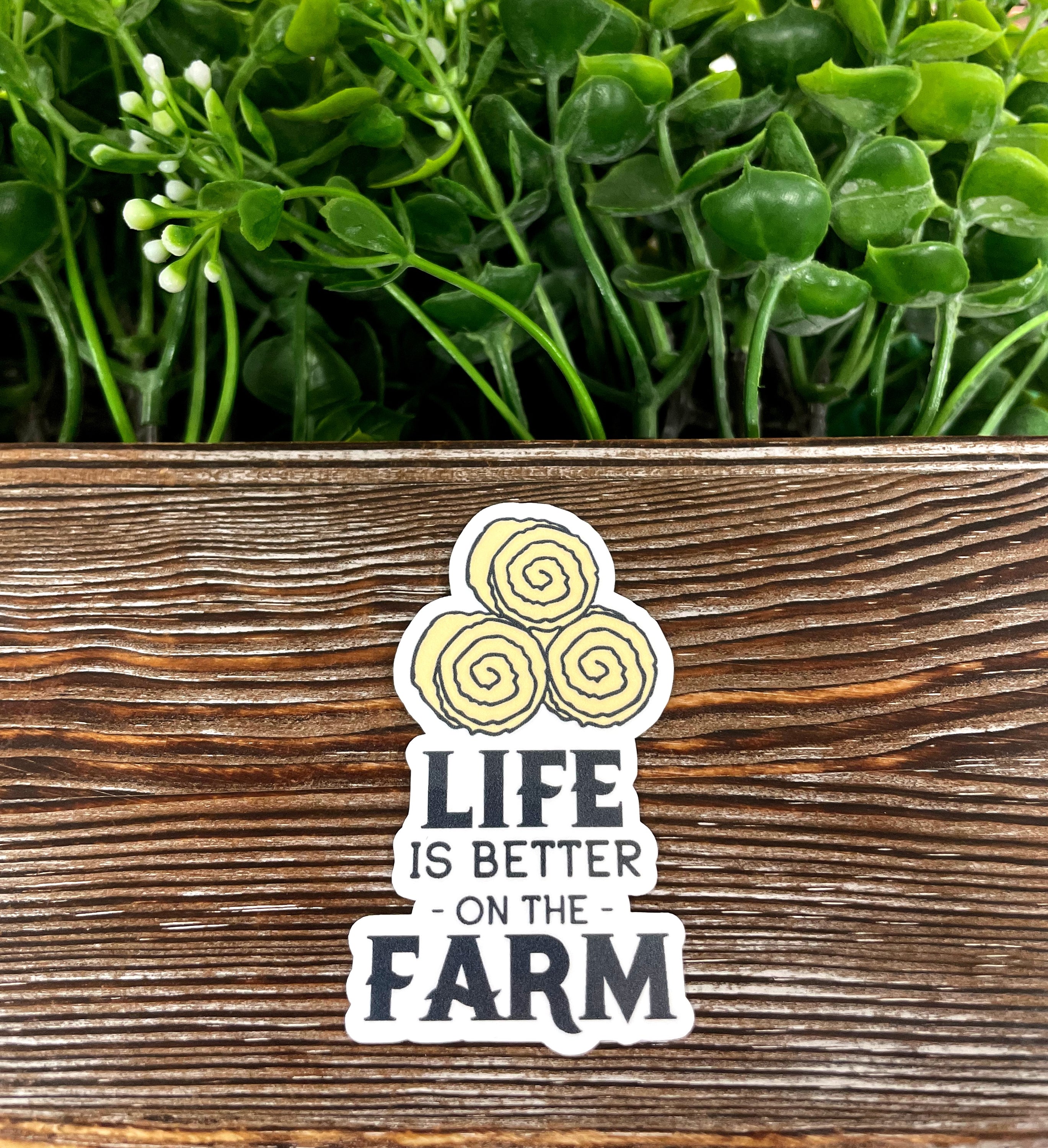 Die cut vinyl sticker featuring the phrase 'Life is Better on the Farm' with a boho design, suitable for various smooth surfaces.