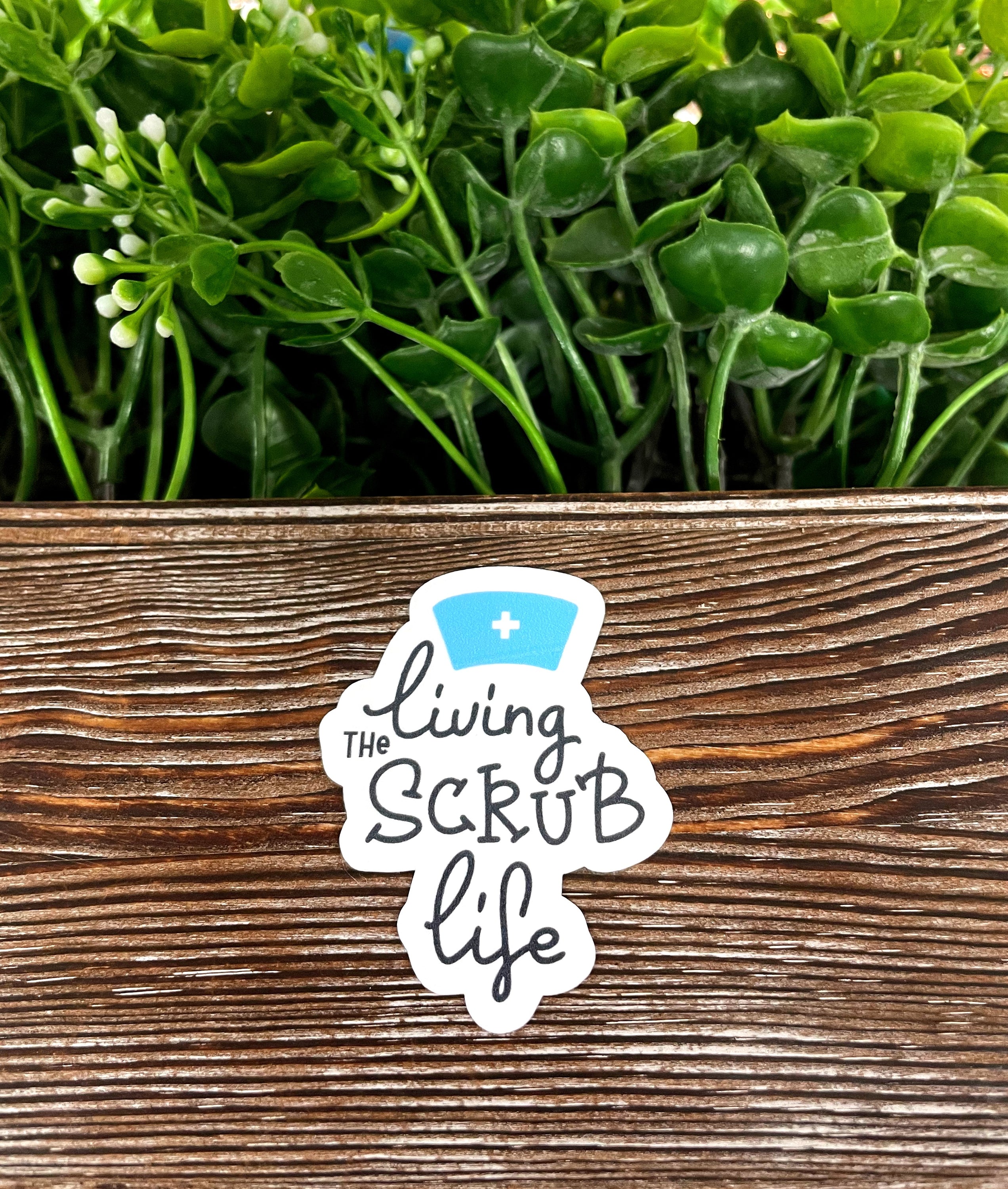 Living the Scrub Life die cut sticker featuring vibrant graphic art, perfect for personalizing smooth surfaces.