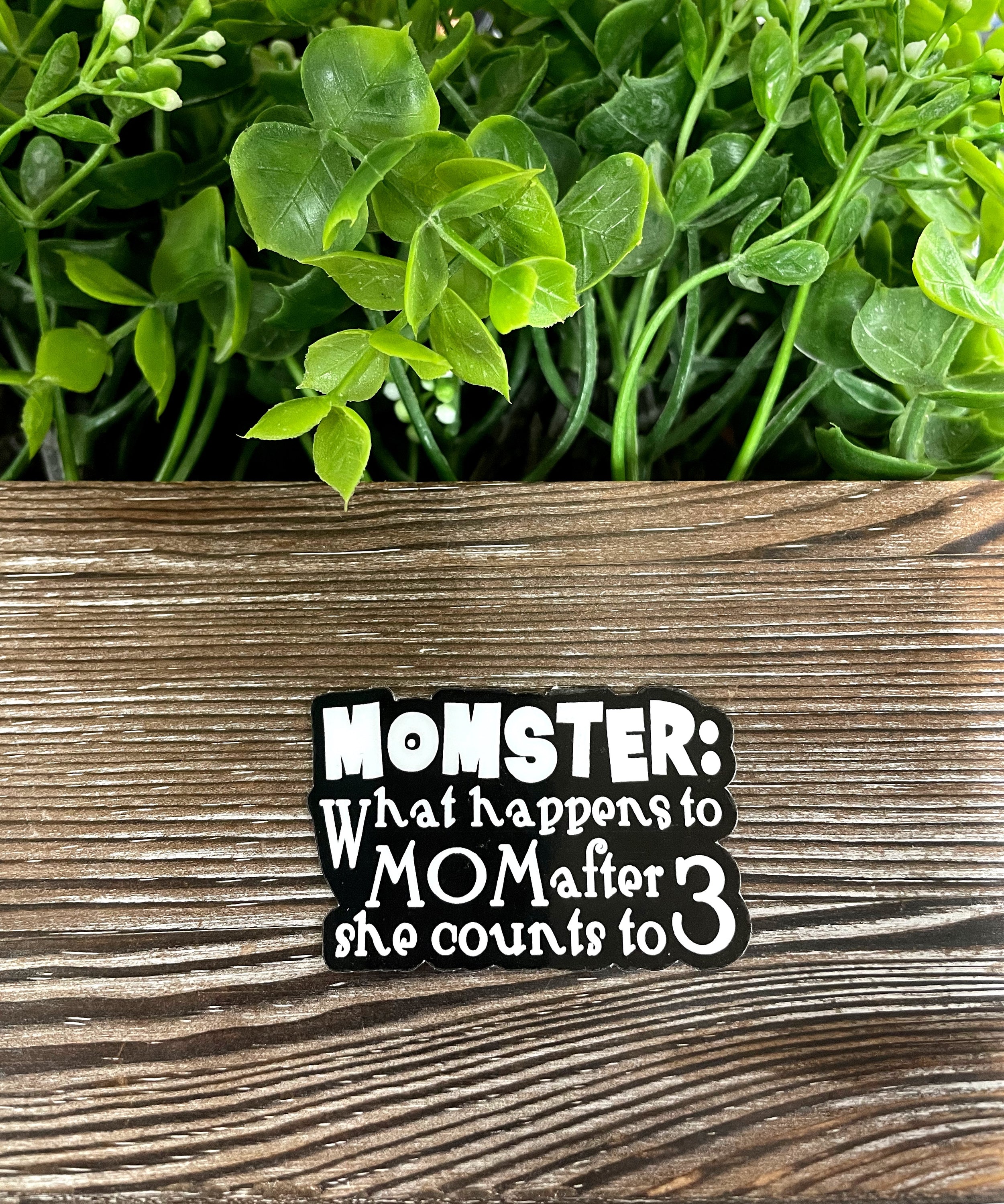 Colorful Momster sticker featuring humorous text about motherhood, ideal for personalizing items.